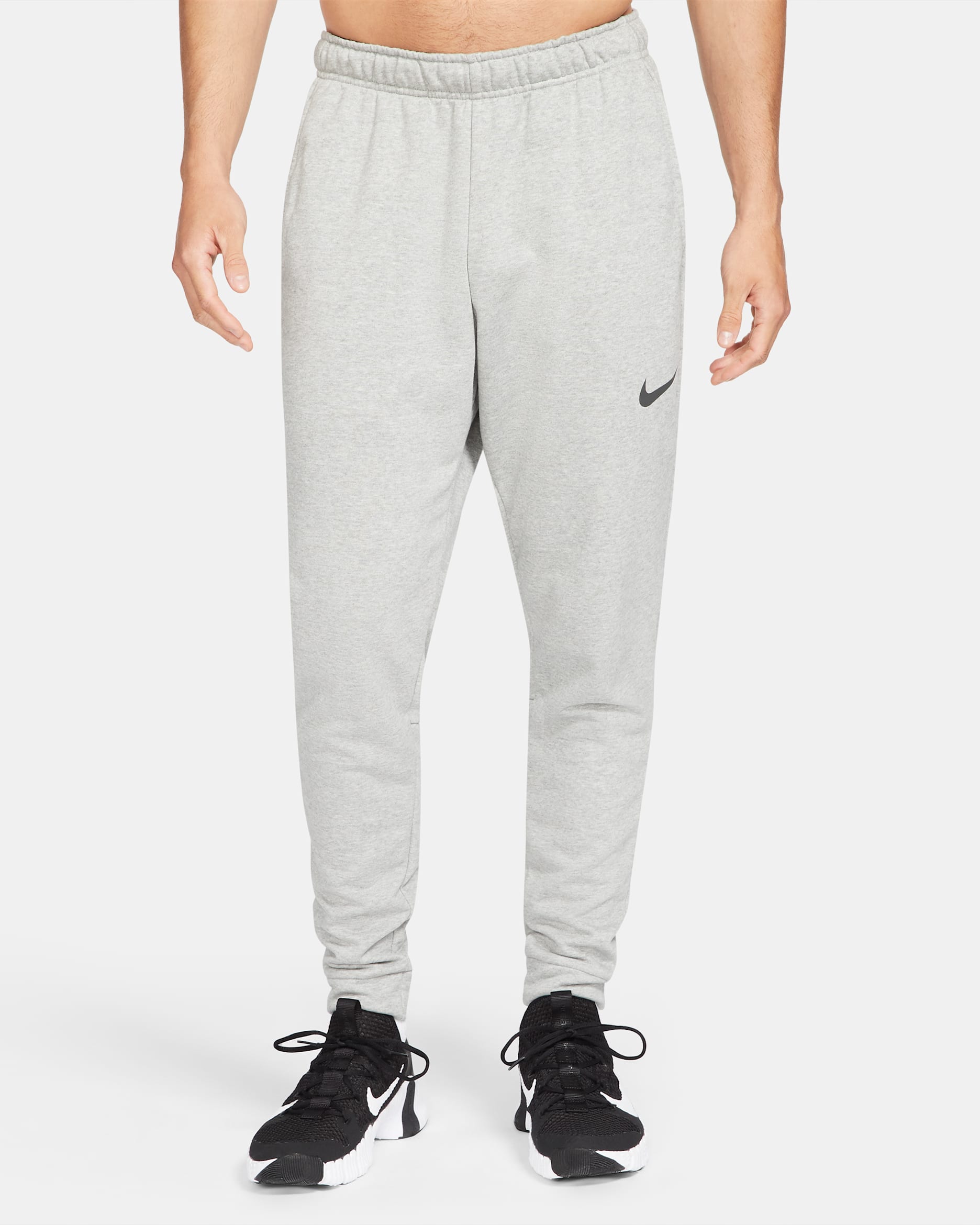 Nike Dry avsmalnet fleecetreningsbukse med Dri-FIT til herre - Dark Grey Heather/Svart