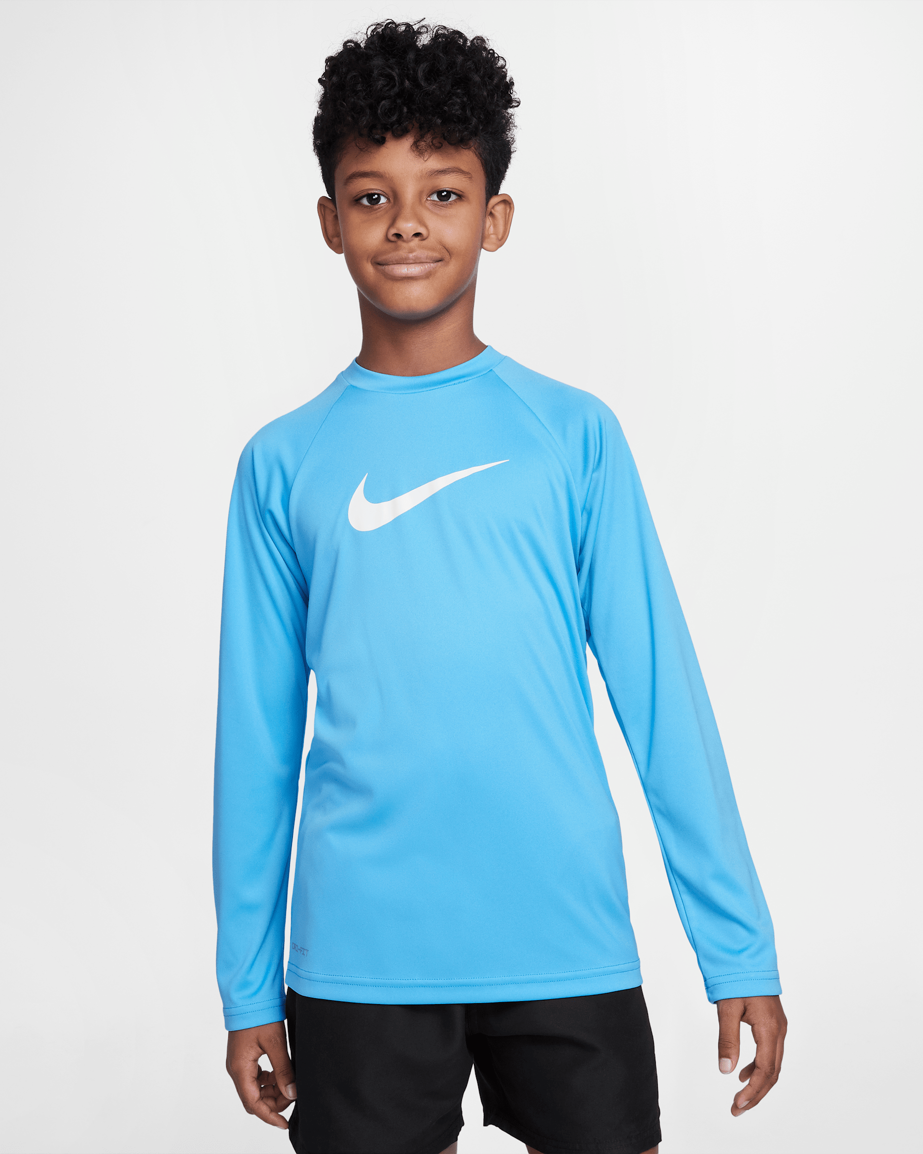 Playera de manga larga Hydroguard para niño talla grande Nike Swim Solid - Azul universitario/Blanco