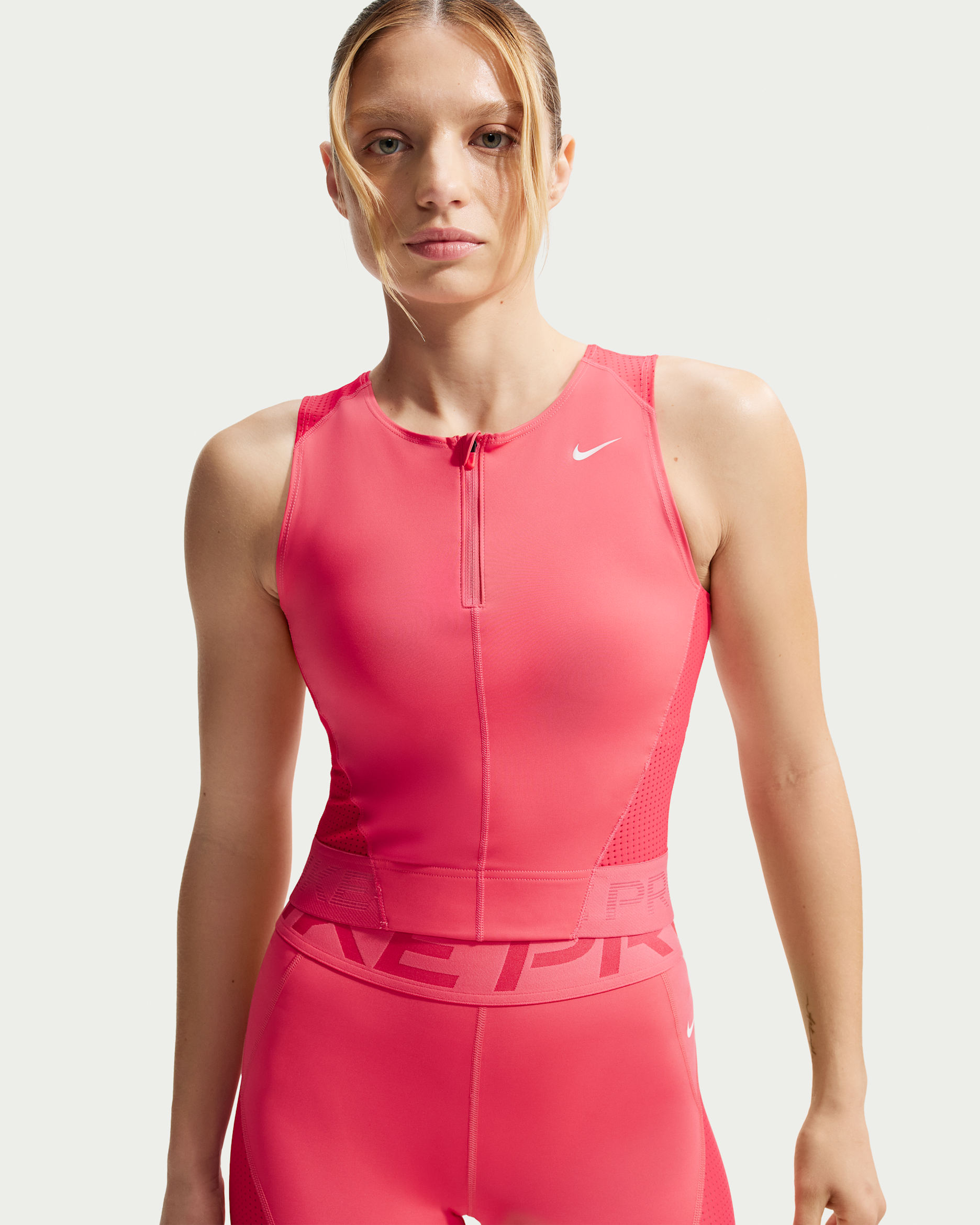 Nike Pro Women's Dri-FIT Tank Top - Sea Coral/Light Fusion Red/White