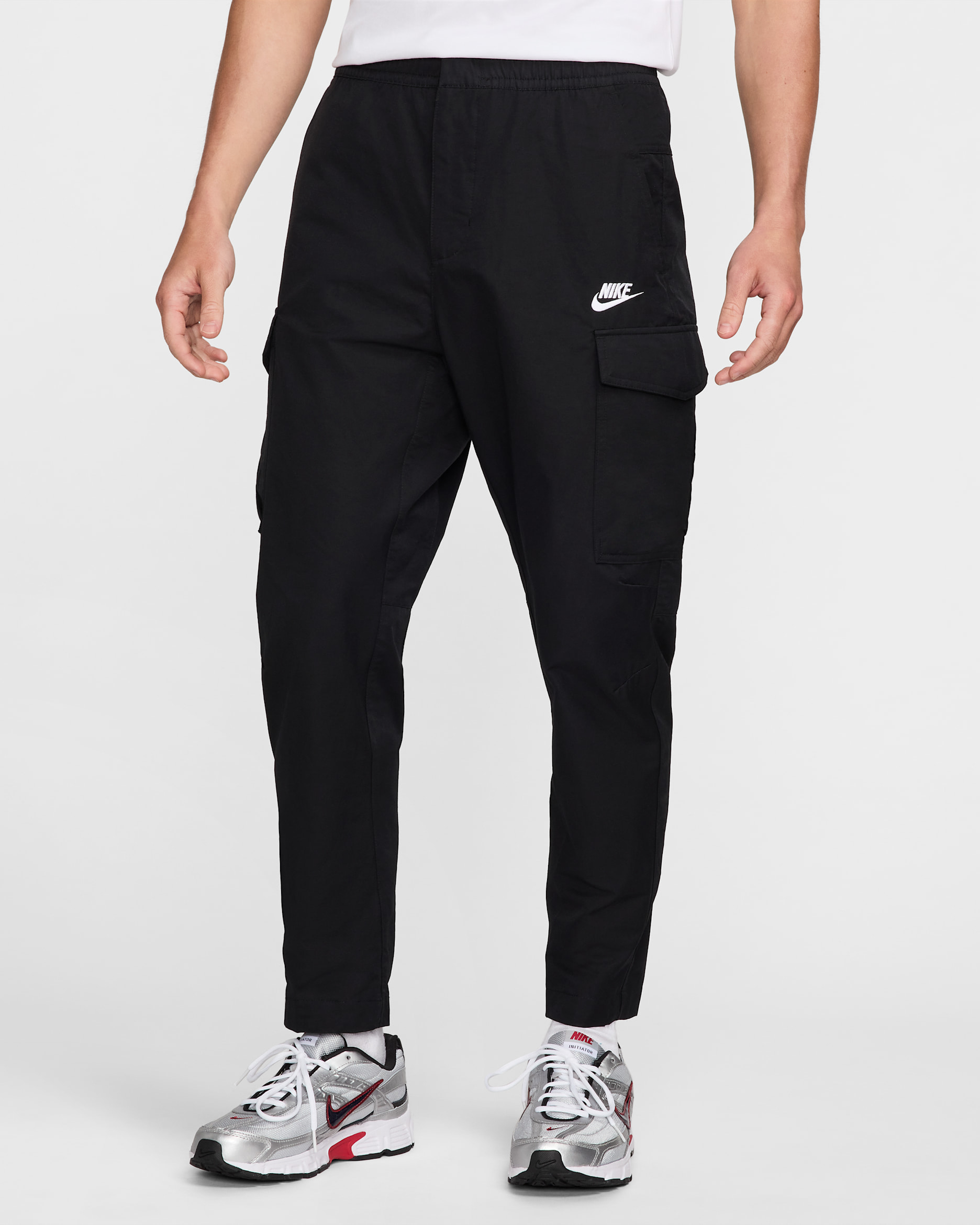 กางเกงขายาวทรงคาร์โก้อเนกประสงค์ไม่มีซับในผู้ชาย Nike Sportswear - ดำ/ขาว