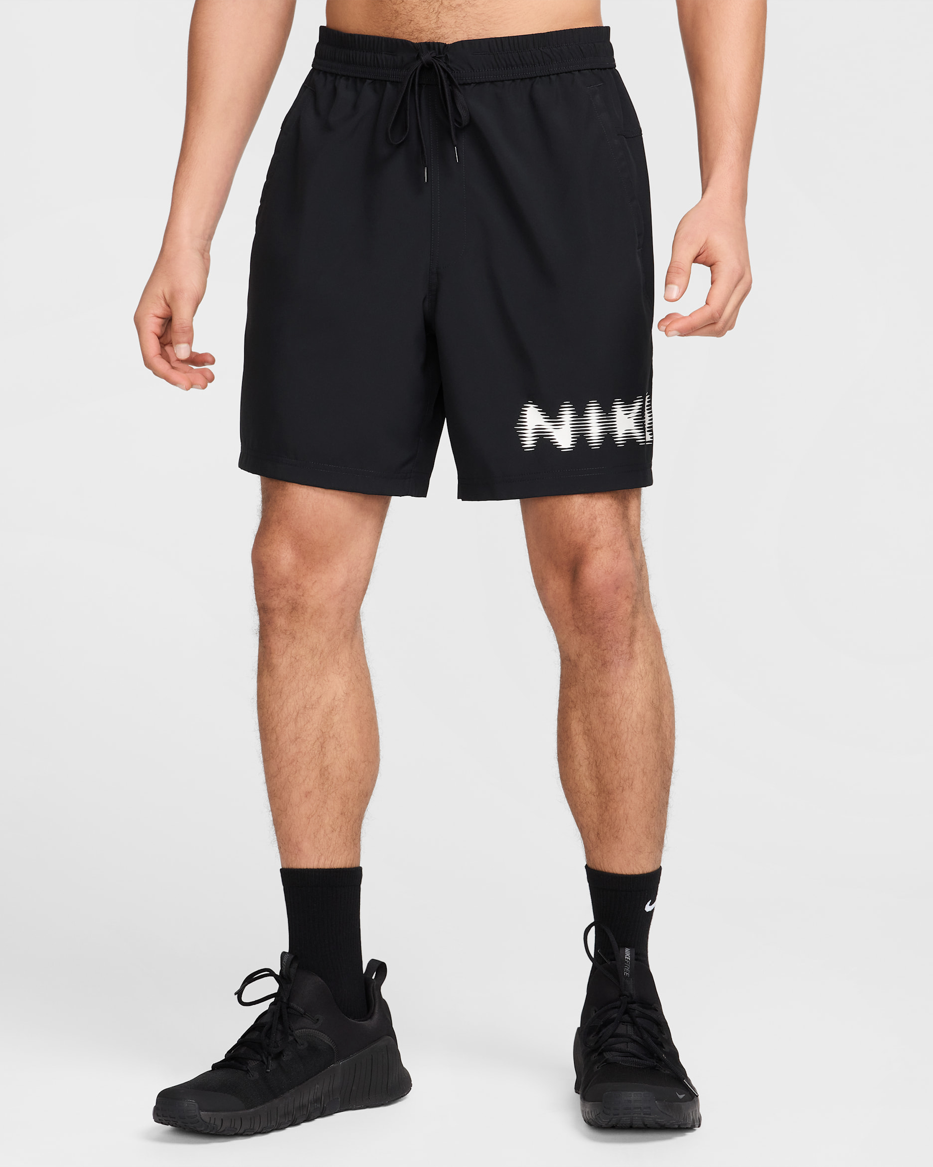 Shorts versátiles Dri-FIT de 18 cm sin forro para hombre Nike Form - Negro/Blanco