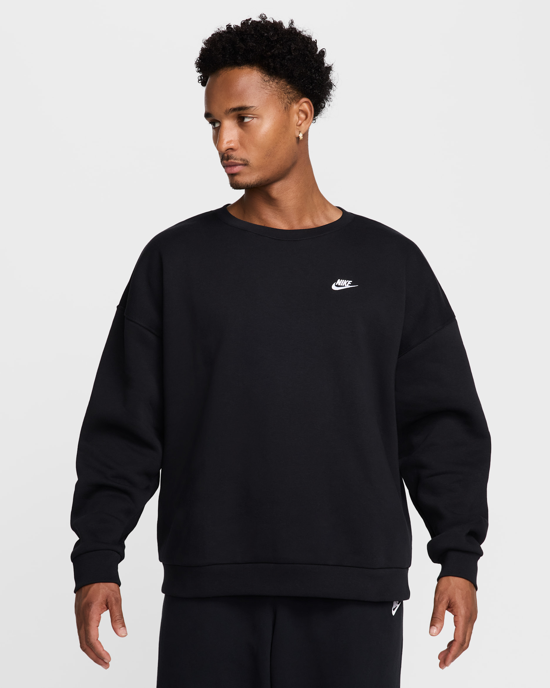 Fleecetröja Nike Sportswear Club i oversizemodell med rund hals för män - Svart