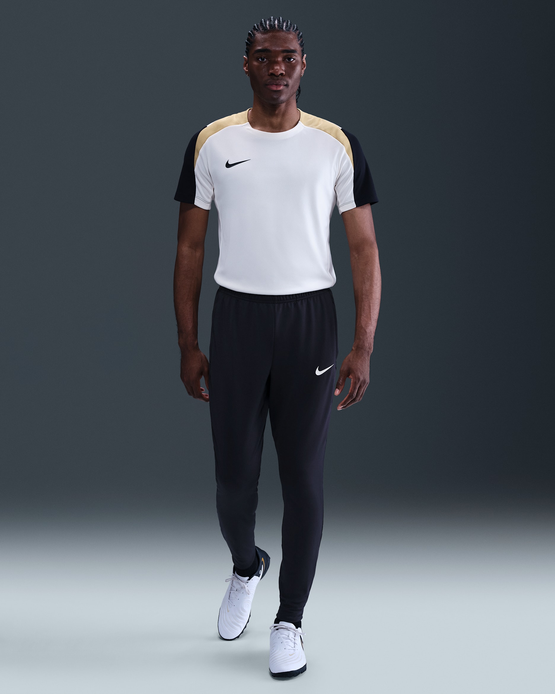 Ανδρικό ποδοσφαιρικό παντελόνι Dri-FIT Nike Strike - Μαύρο/Jersey Gold/Pale Ivory