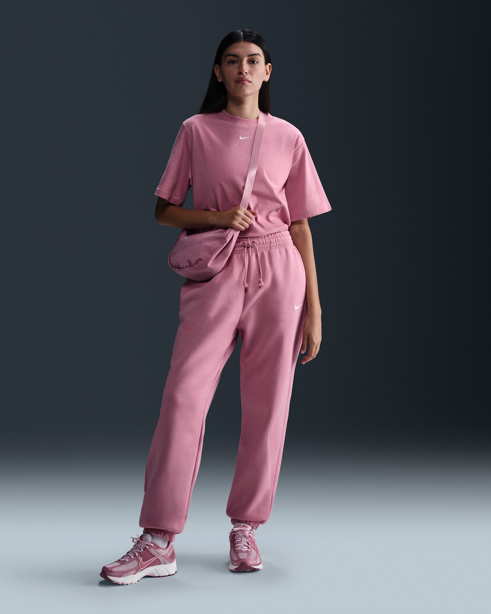 Pants de entrenamiento oversized de tiro alto para mujer Nike Sportswear Phoenix Fleece - Rosa elemental/Vela