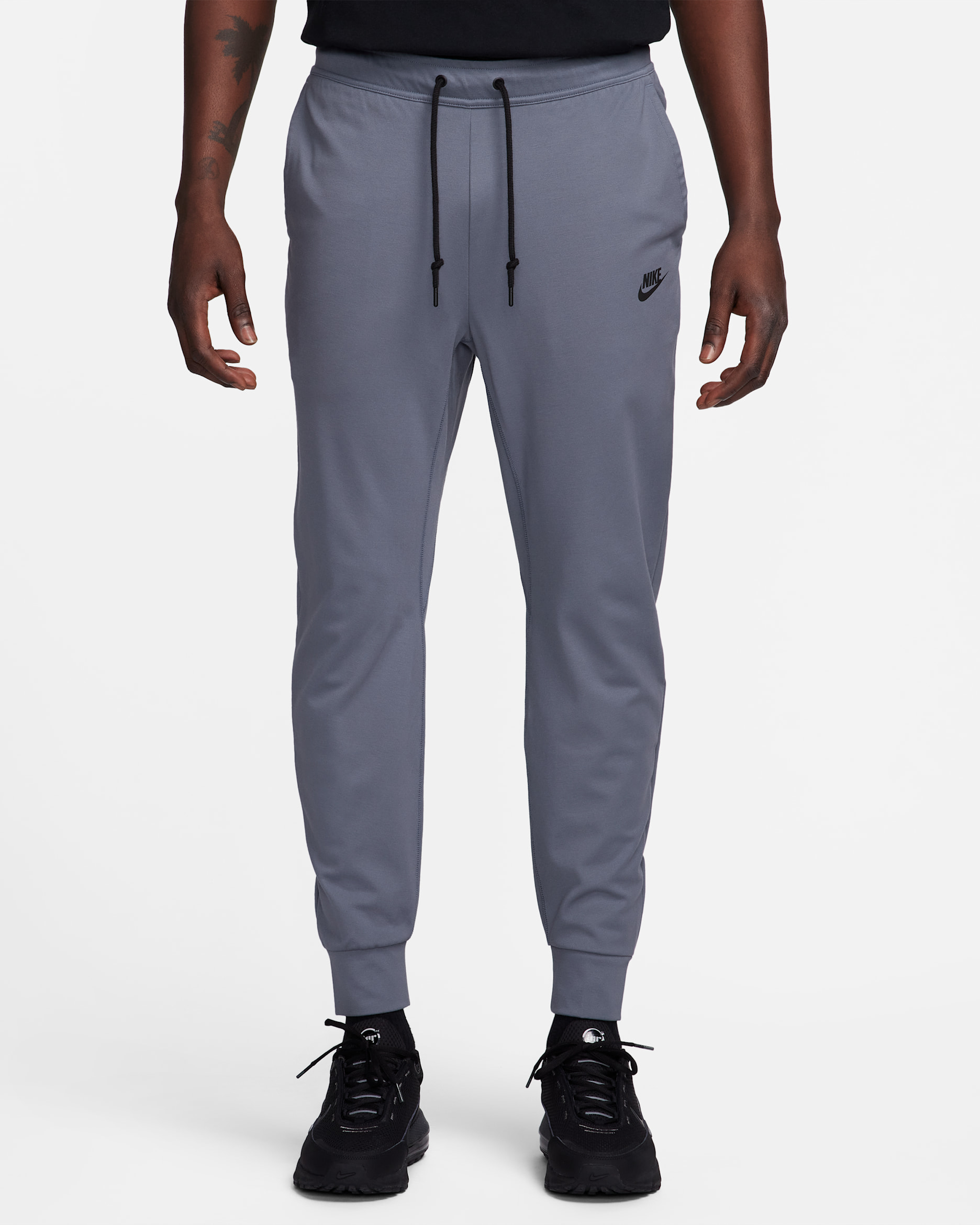 Joggers ligeros de tejido Knit para hombre Nike Sportswear Tech - Carbón claro/Negro