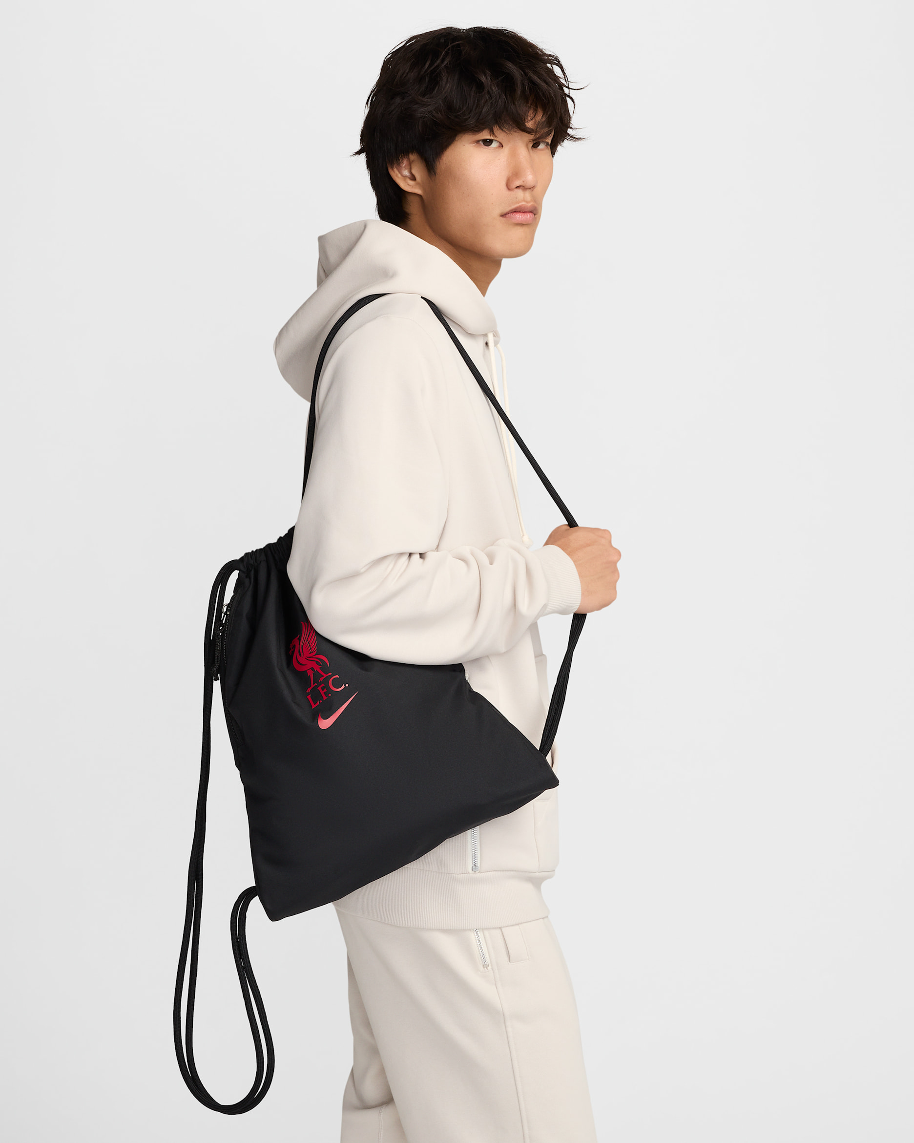 Taška Liverpool F.C. Heritage se stahovací šňůrou (13 l) - Černá/Gym Red