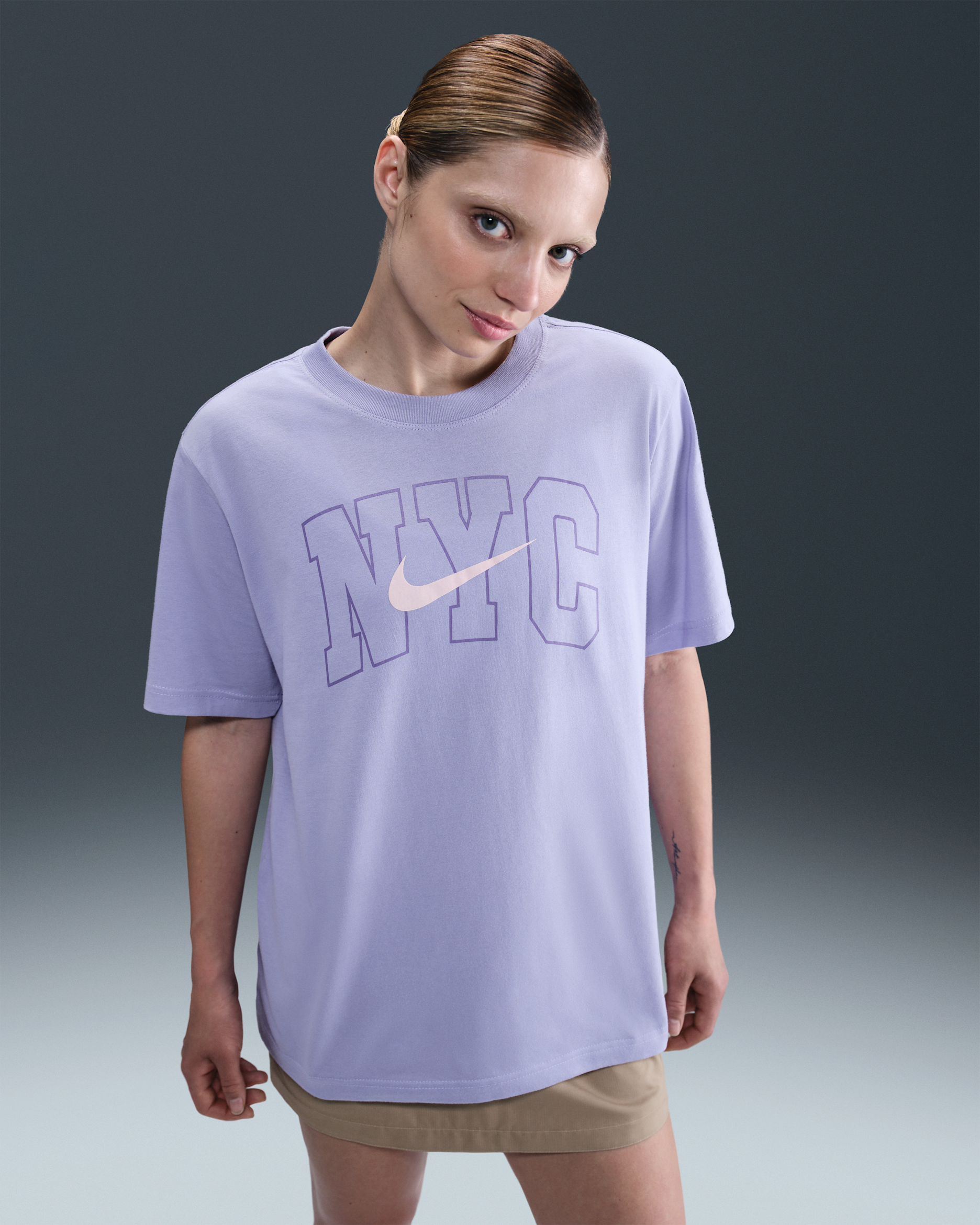 Nike Sportswear Essential Women's Graphic T-Shirt - Lilac Ice/Washed Coral