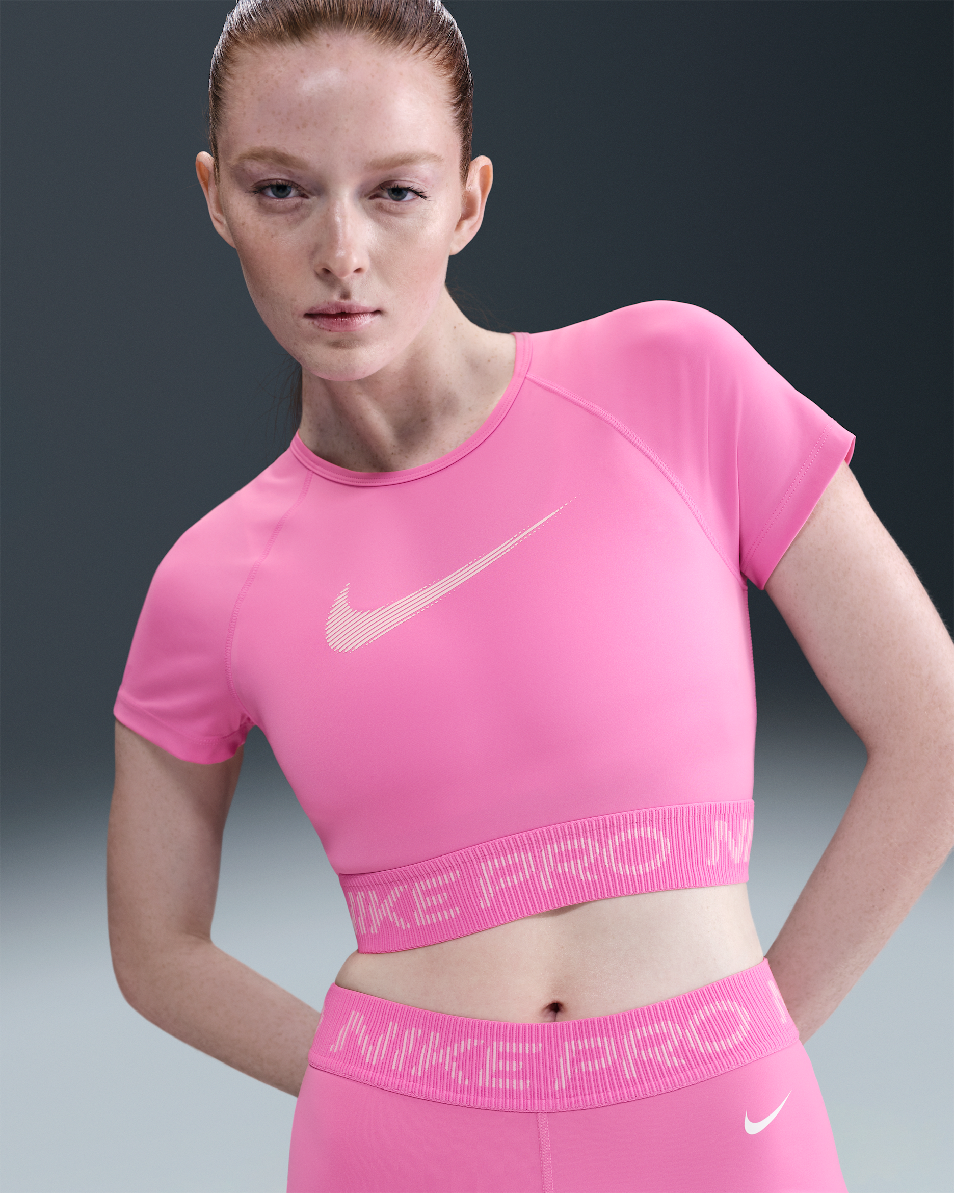 Nike Pro Women's Dri-FIT Short-Sleeve Cropped Graphic Top - Playful Pink/Pink Foam/White