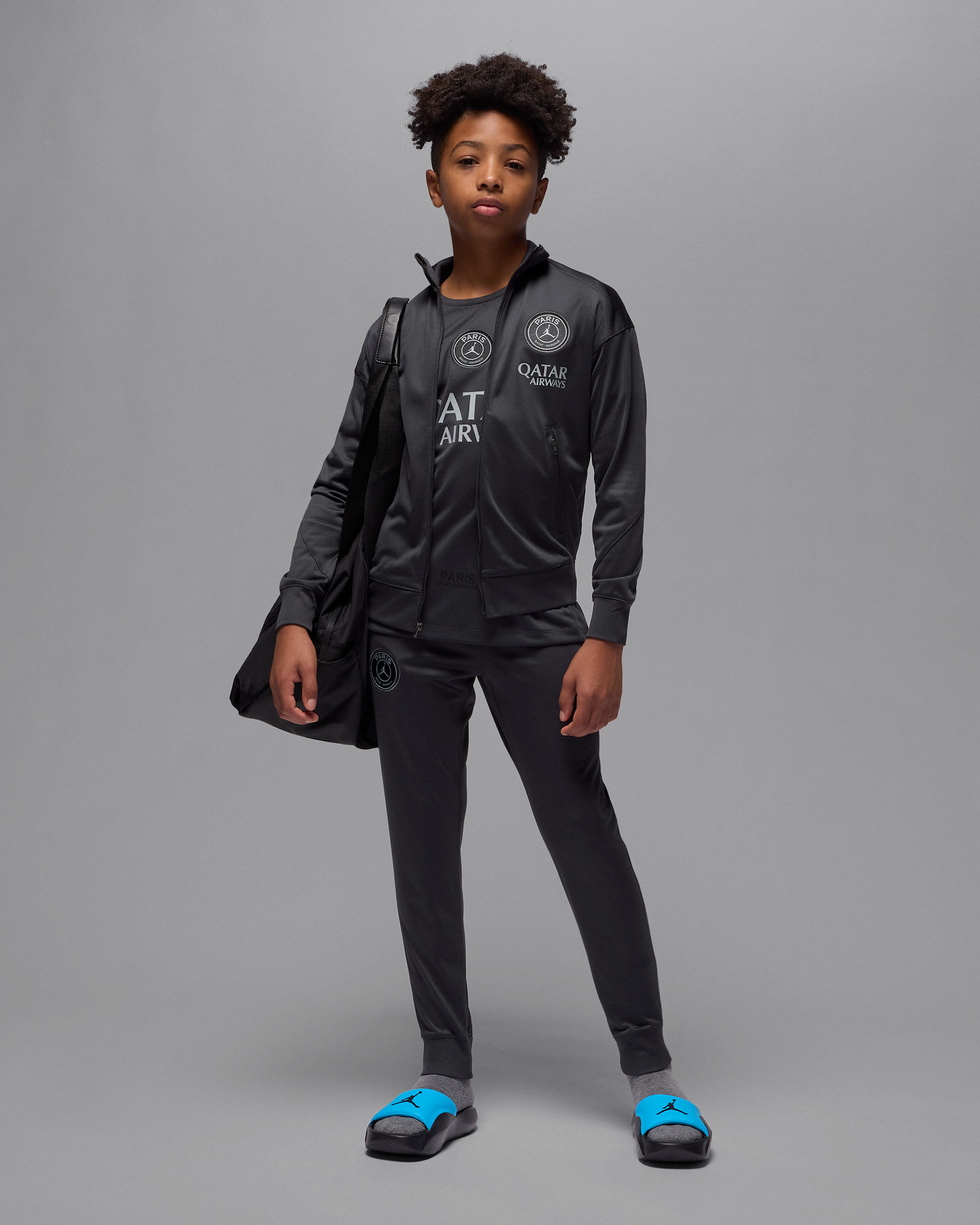 Paris Saint-Germain Strike Fourth Jordan Dri-FIT Fußball-Trainingsanzug für ältere Kinder - Off Noir/Off Noir/Particle Grey