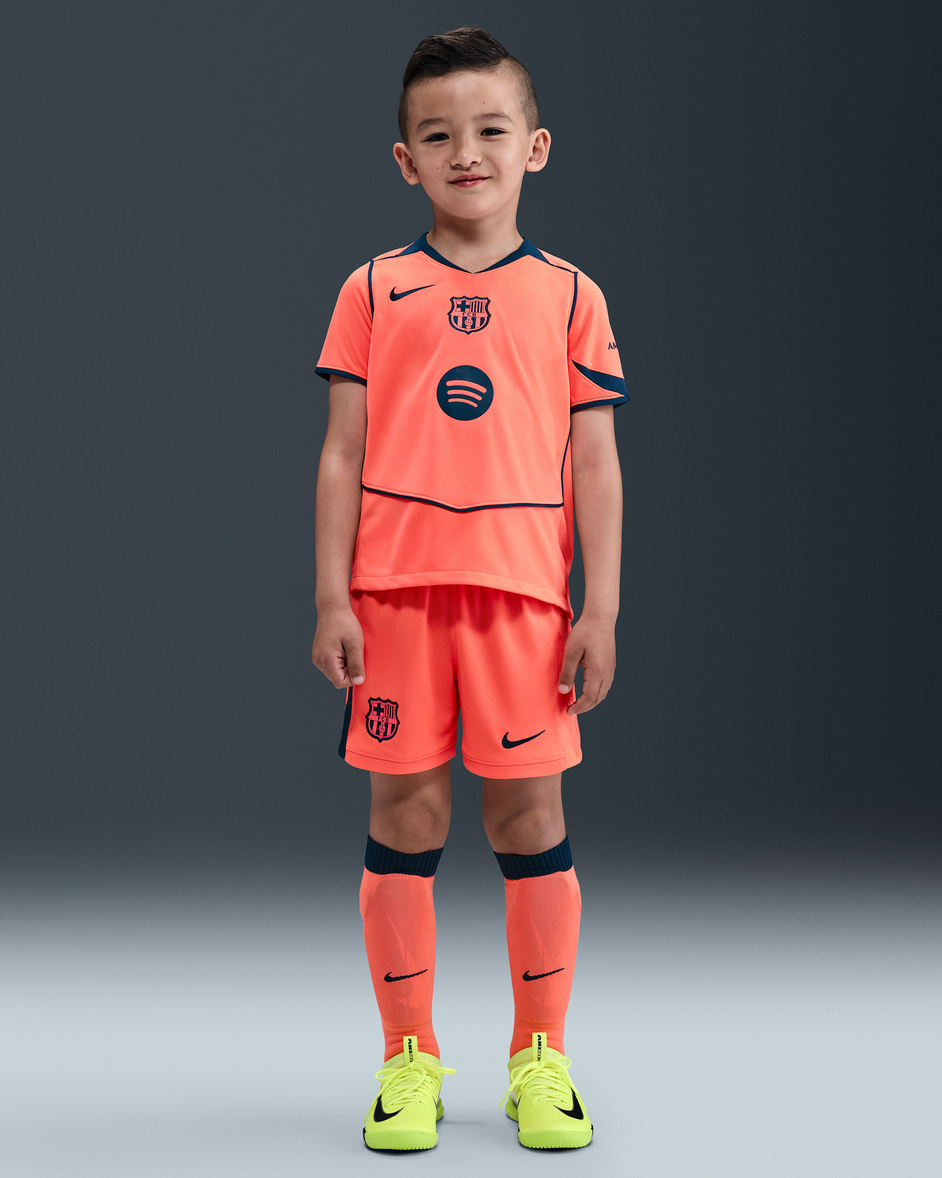 F.C. Barcelona 2025/26 Stadium Third Younger Kids' Nike Dri-FIT Total 90 Football 3-Piece Kit - Bright Mango/Midnight Navy/Midnight Navy