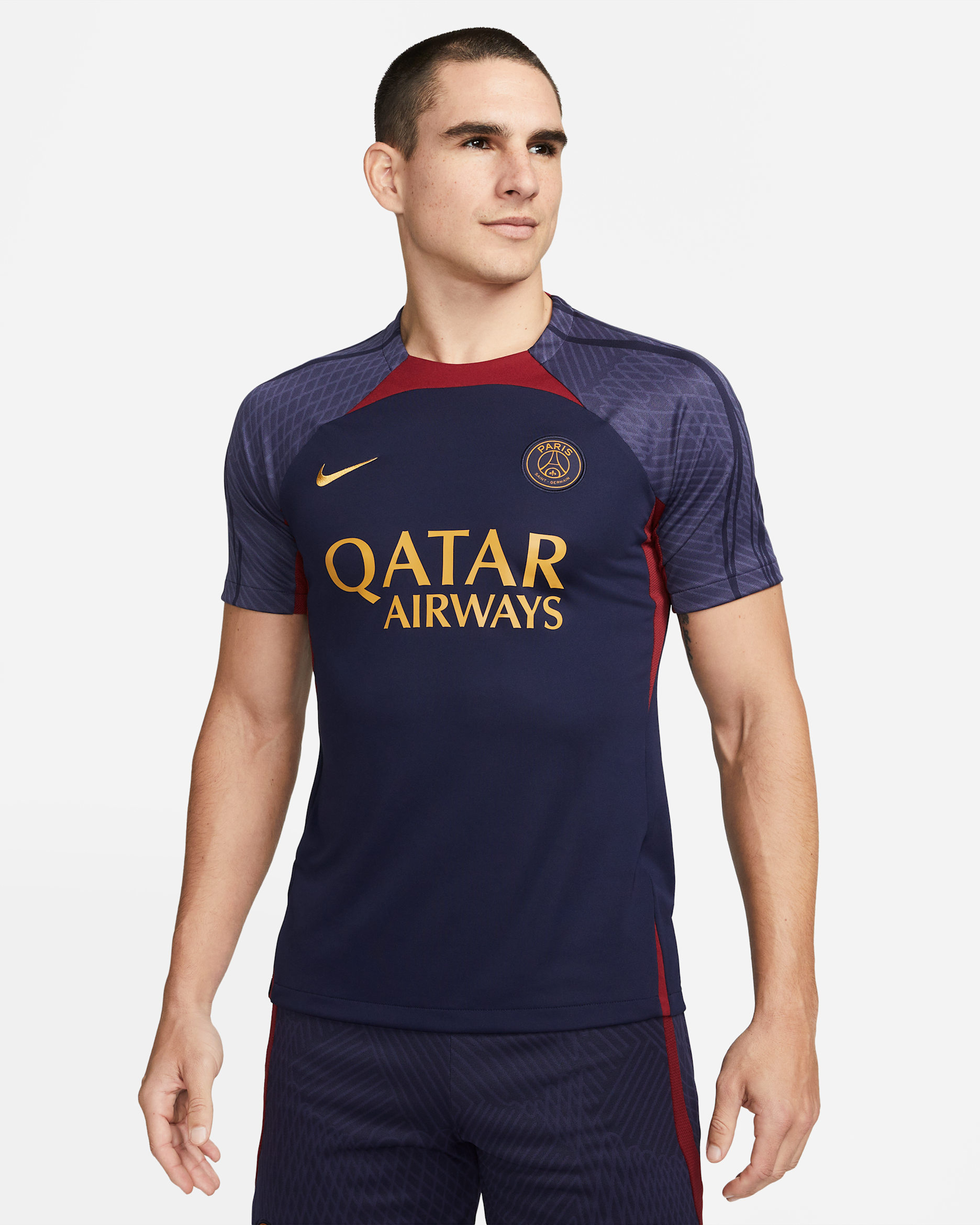 Paris Saint-Germain Strike Men's Nike Dri-FIT Knit Football Top - Blackened Blue/Blackened Blue/Team Red/Gold Suede