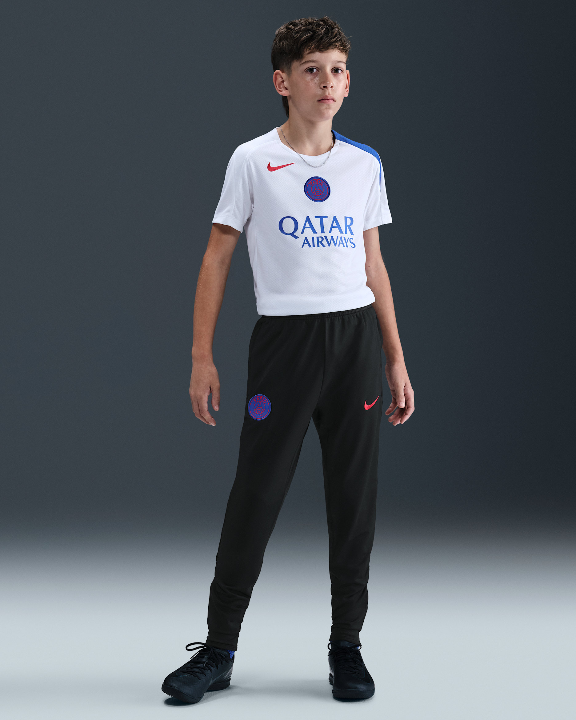 Paris Saint-Germain Strike Third Nike Dri-FIT Total 90 Fußballhose aus Strickmaterial (ältere Kinder) - Schwarz/Hyper Royal/Global Red
