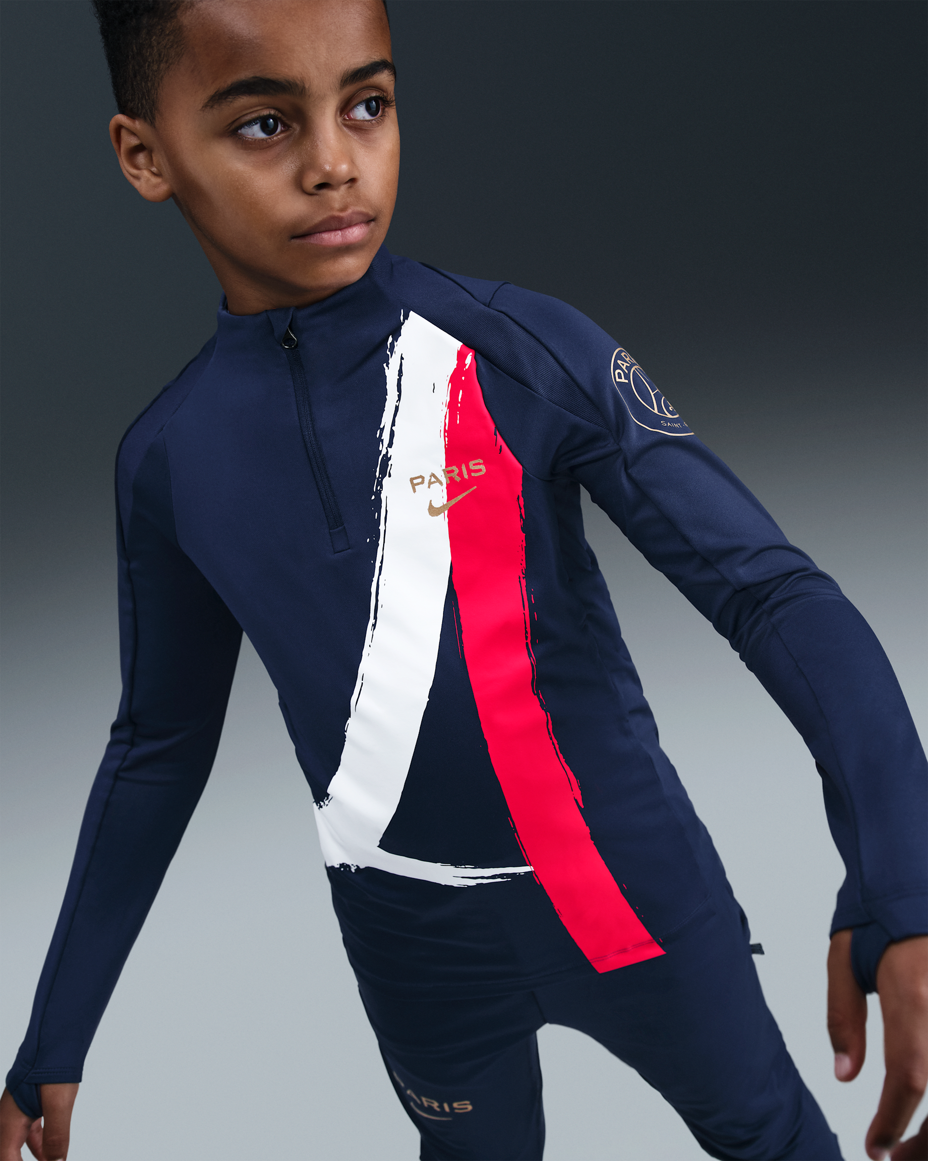 Paris Saint-Germain Strike Nike Dri-FIT-fodboldtræningstrøje til større børn - Midnight Navy/Metallic Gold