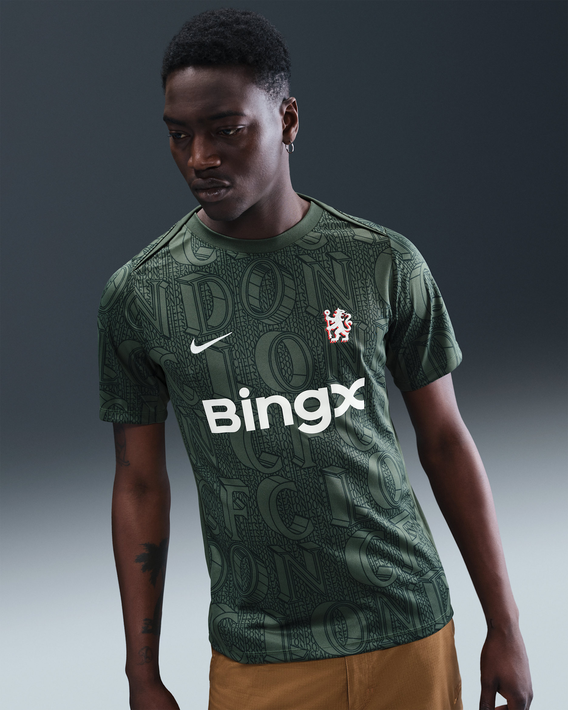 Pánské předzápasové fotbalové tričko Nike Dri-FIT Chelsea FC Academy Pro - Galactic Jade/Outdoor Green/Phantom