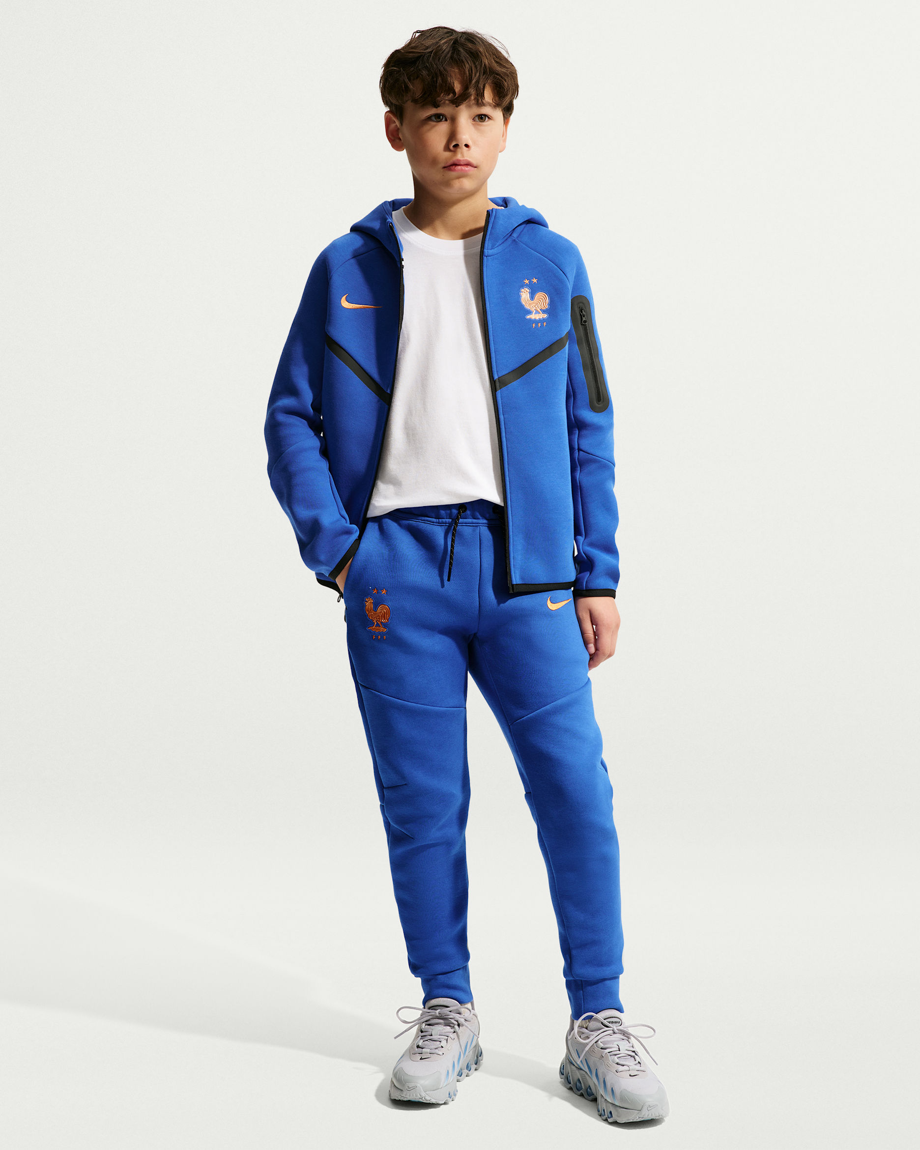 FFF Tech Fleece Older Kids' (Boys') Nike Football Pants - Game Royal/Metallic Copper