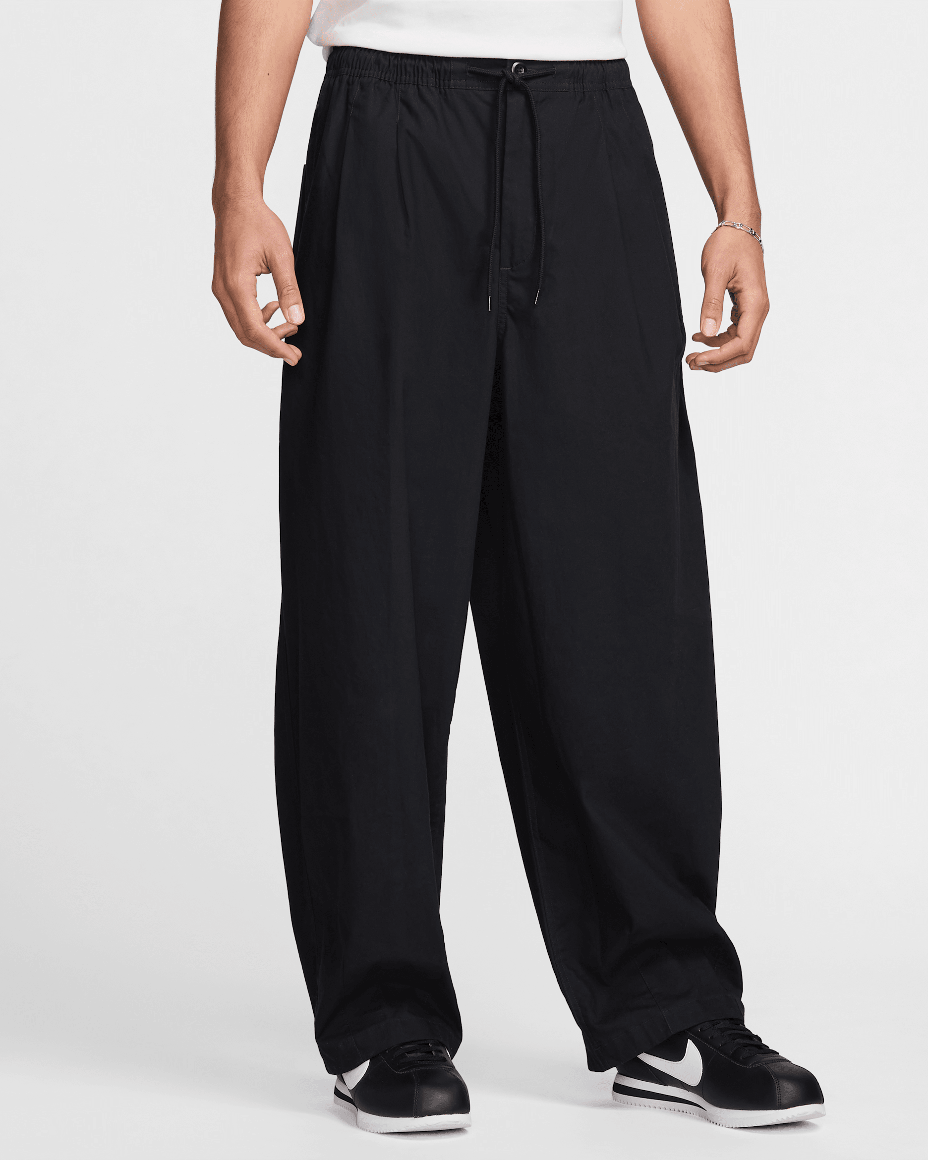 Pants globo para hombre Nike Club - Negro/Negro