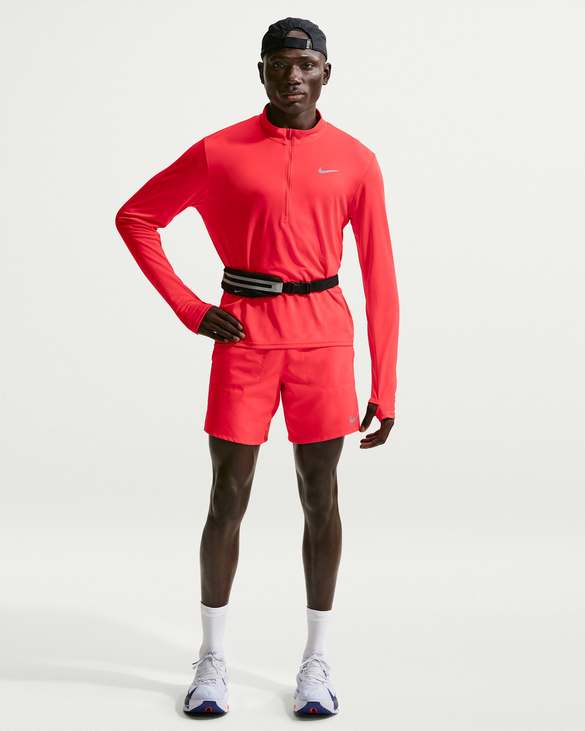 Calções de running forrados com slips de 18 cm Dri-FIT Nike Stride para homem - Carmesim claro