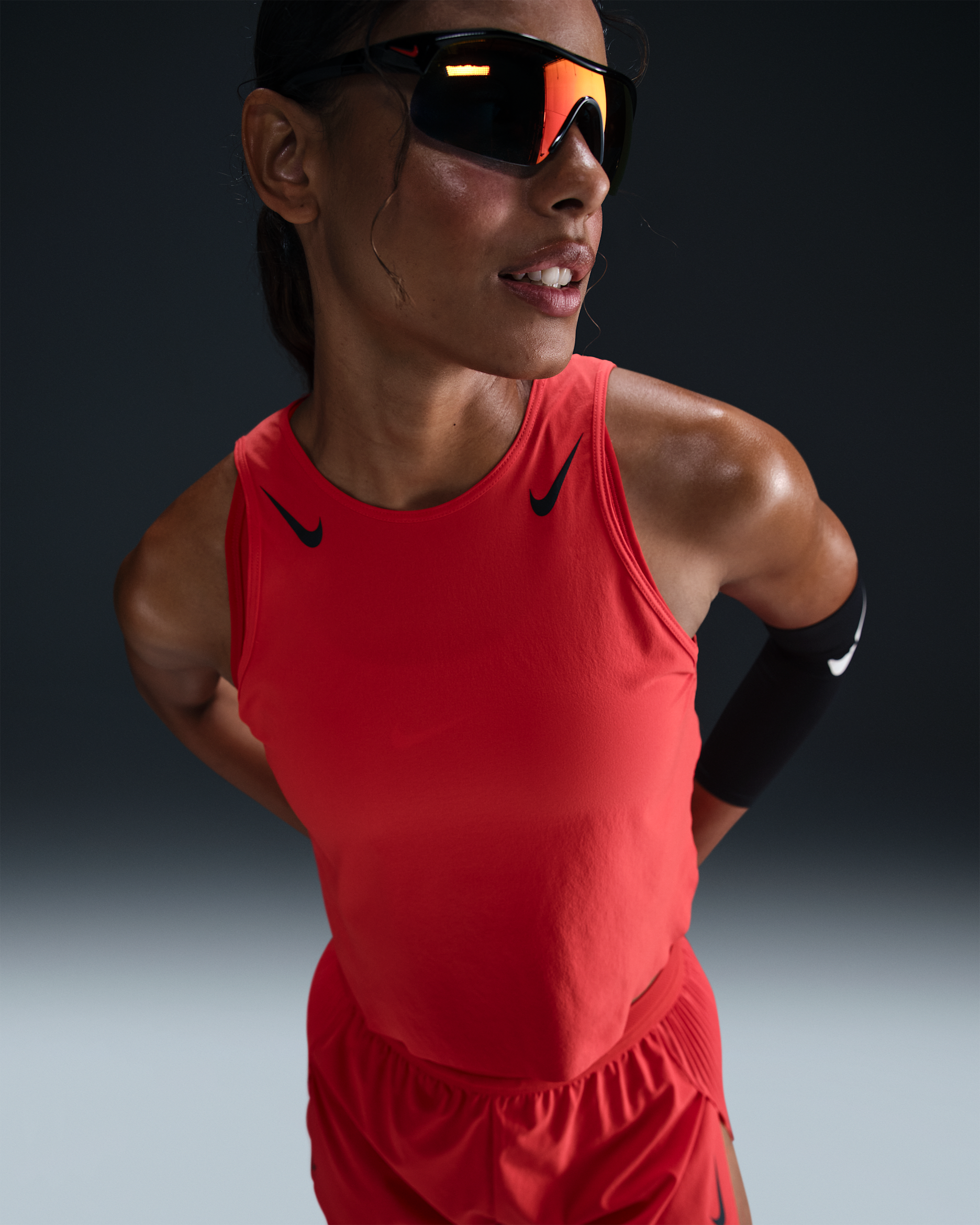 Nike AeroSwift Women's Dri-FIT ADV Cropped Running Tank Top - Light Crimson/Black