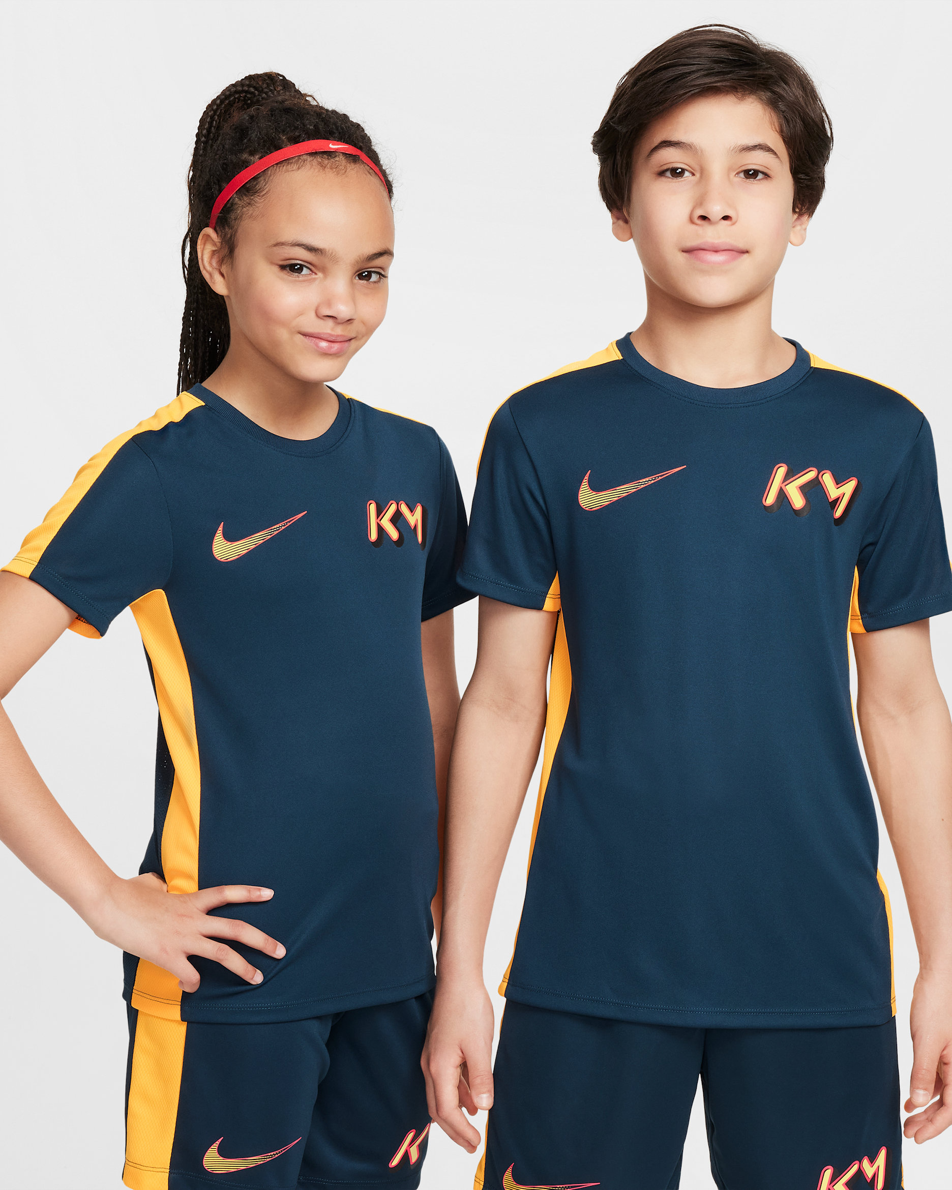 Kylian Mbappé Older Kids' Dri-FIT Academy Football Top - Armoury Navy/Laser Orange