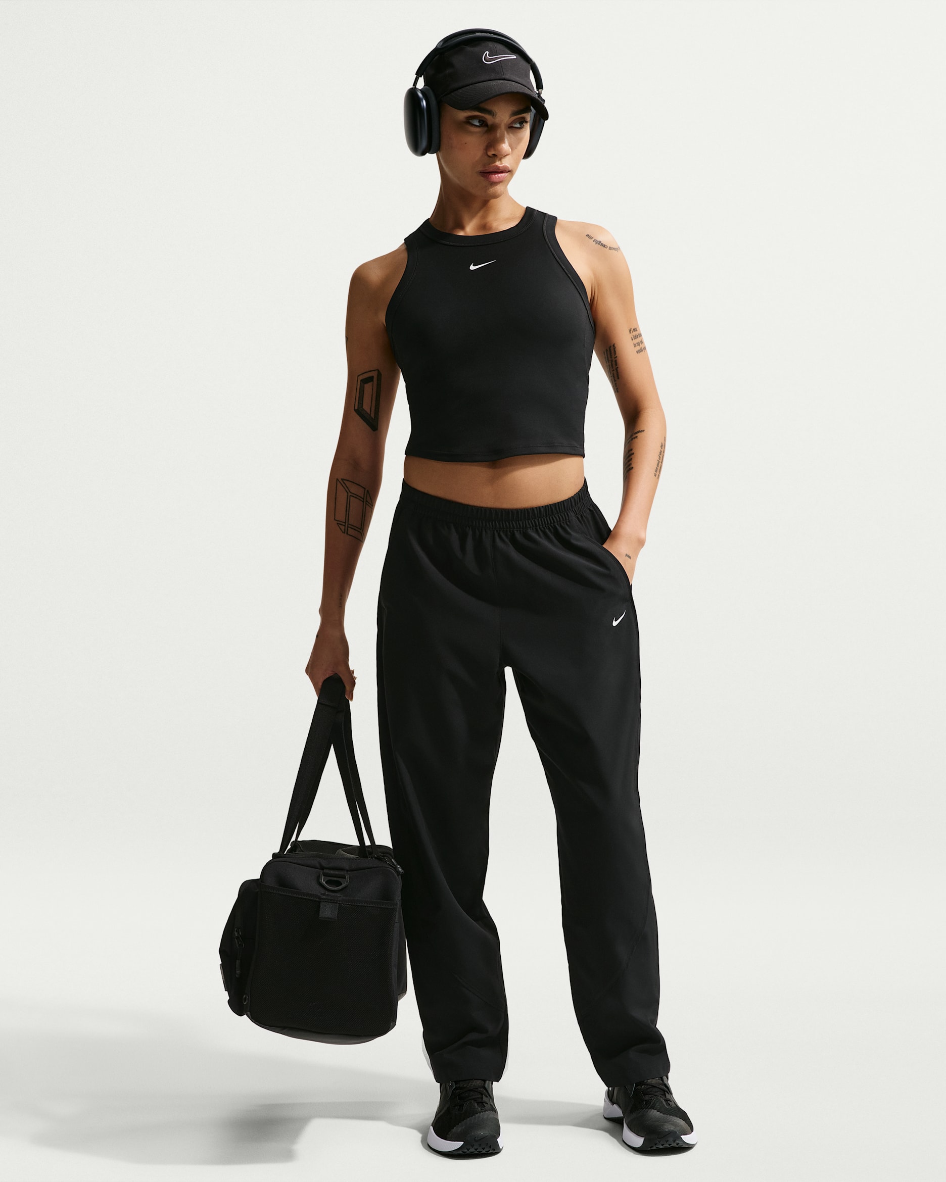 Nike One Women's Dri-FIT Mid-Rise Woven Pants - Black/White