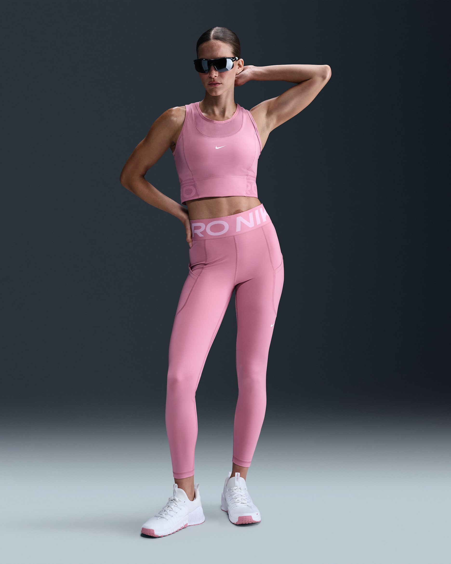 Leggings tiro alto de 7/8 con bolsillos para mujer Nike Pro Sculpt - Rosa elemental/Blanco