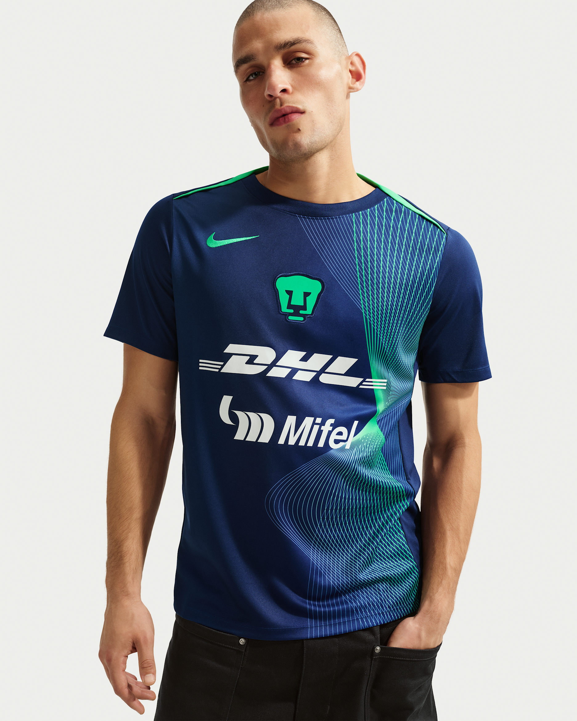Playera de fútbol para antes del partido Nike Dri-FIT para hombre Pumas UNAM Academy Pro - Azul vacío/Verde impacto/Verde impacto