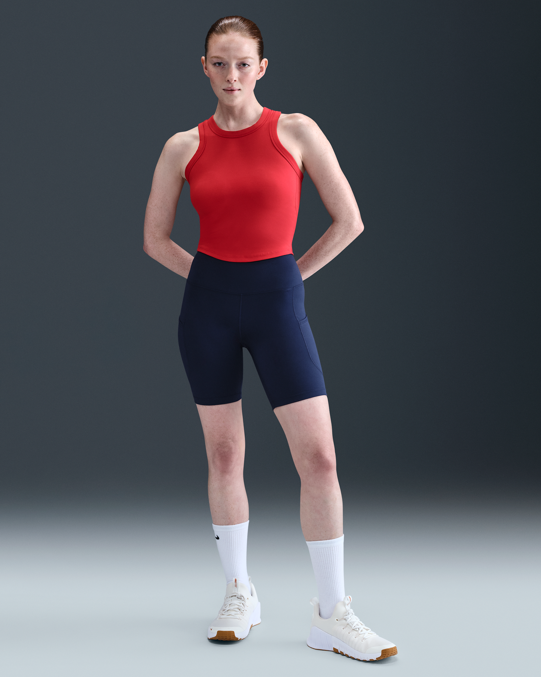 Calções tipo ciclista de 20 cm de cintura subida com bolsos Nike One para mulher - Midnight Navy/Branco