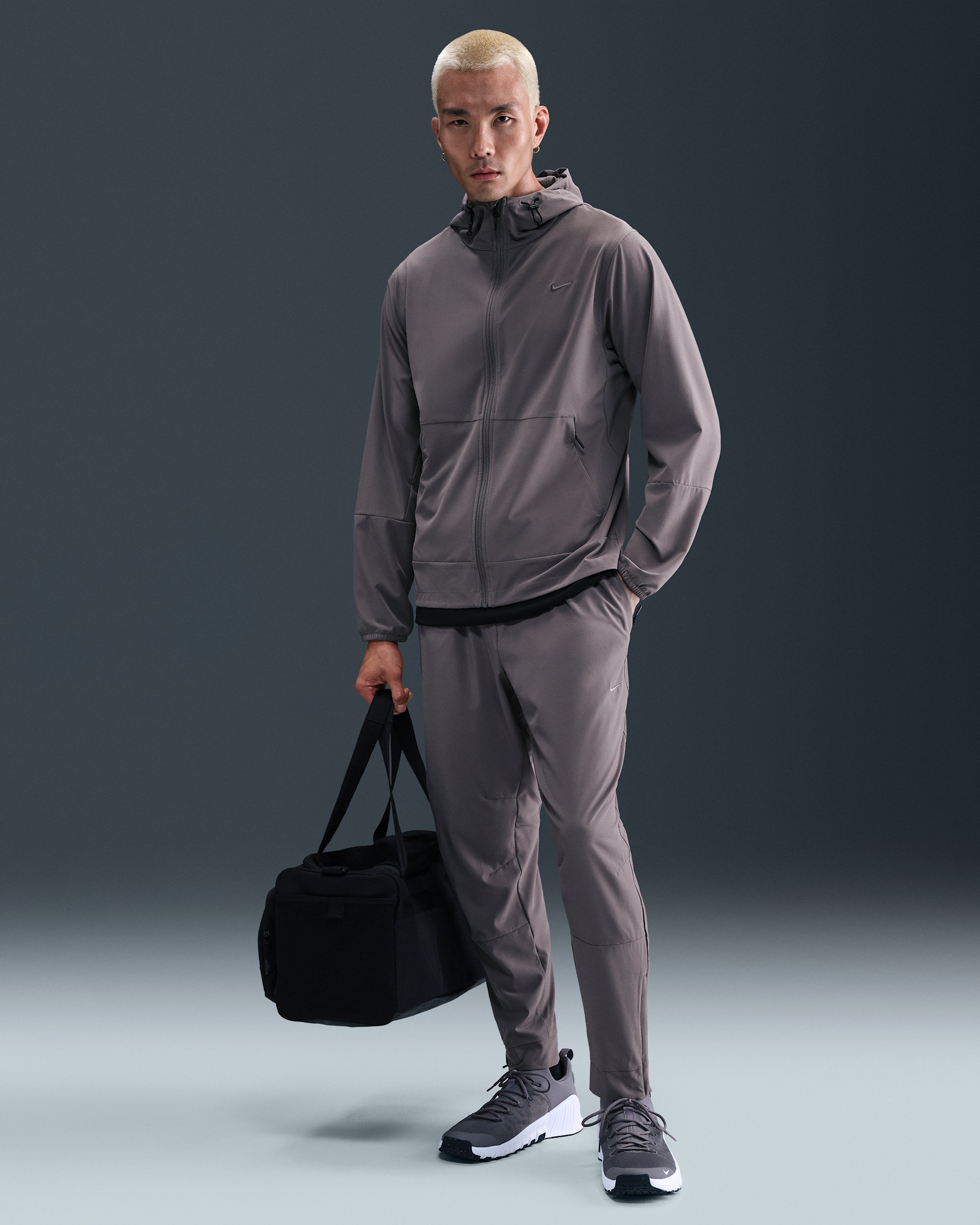 Nike Unlimited Men's Dri-FIT Zippered Cuff Versatile Pants - Cave Stone/Black/Cave Stone