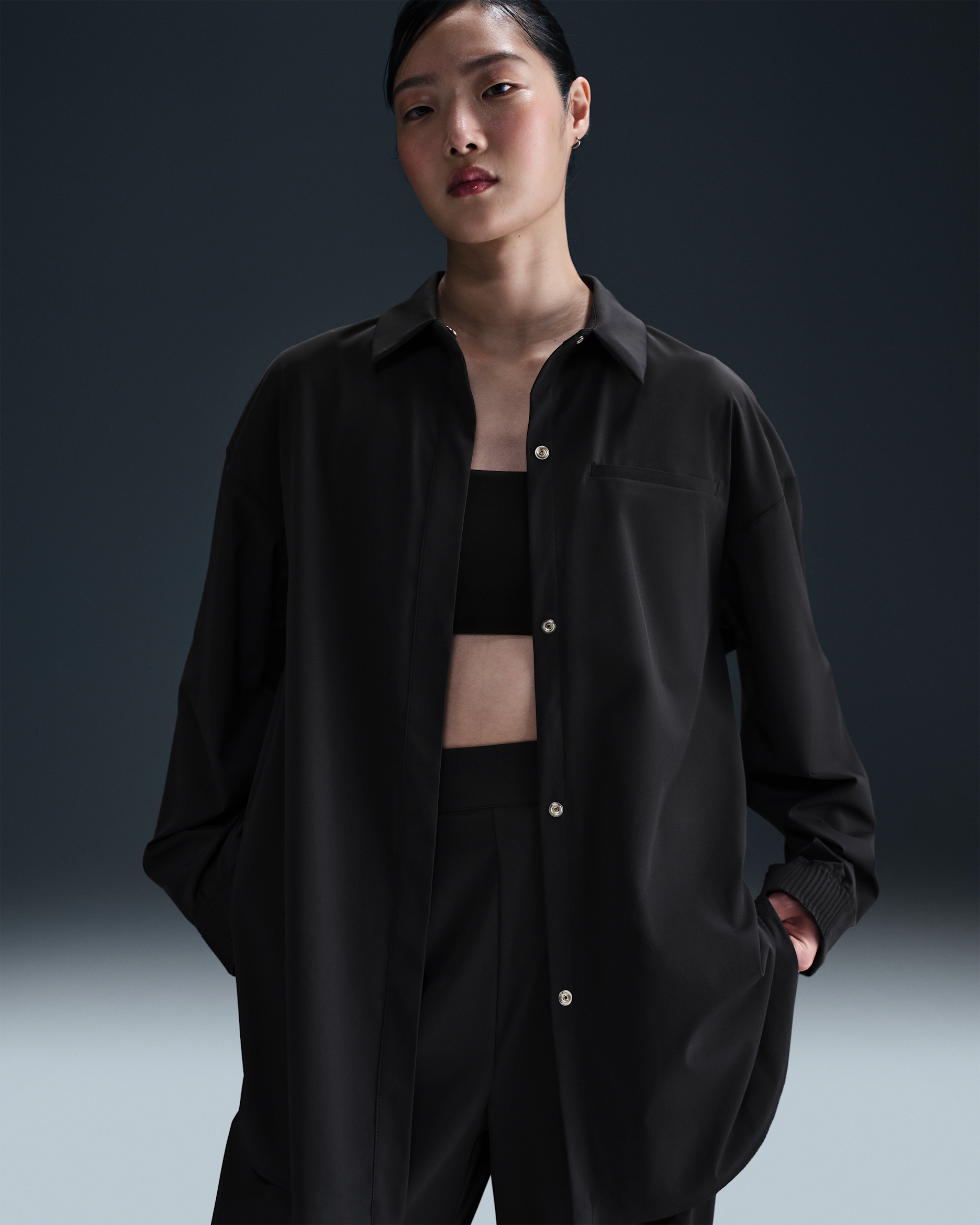 Oversized Nike 24.7 PerfectStretch Dri-FIT-trøje med lange ærmer til kvinder - sort/Dark Smoke Grey