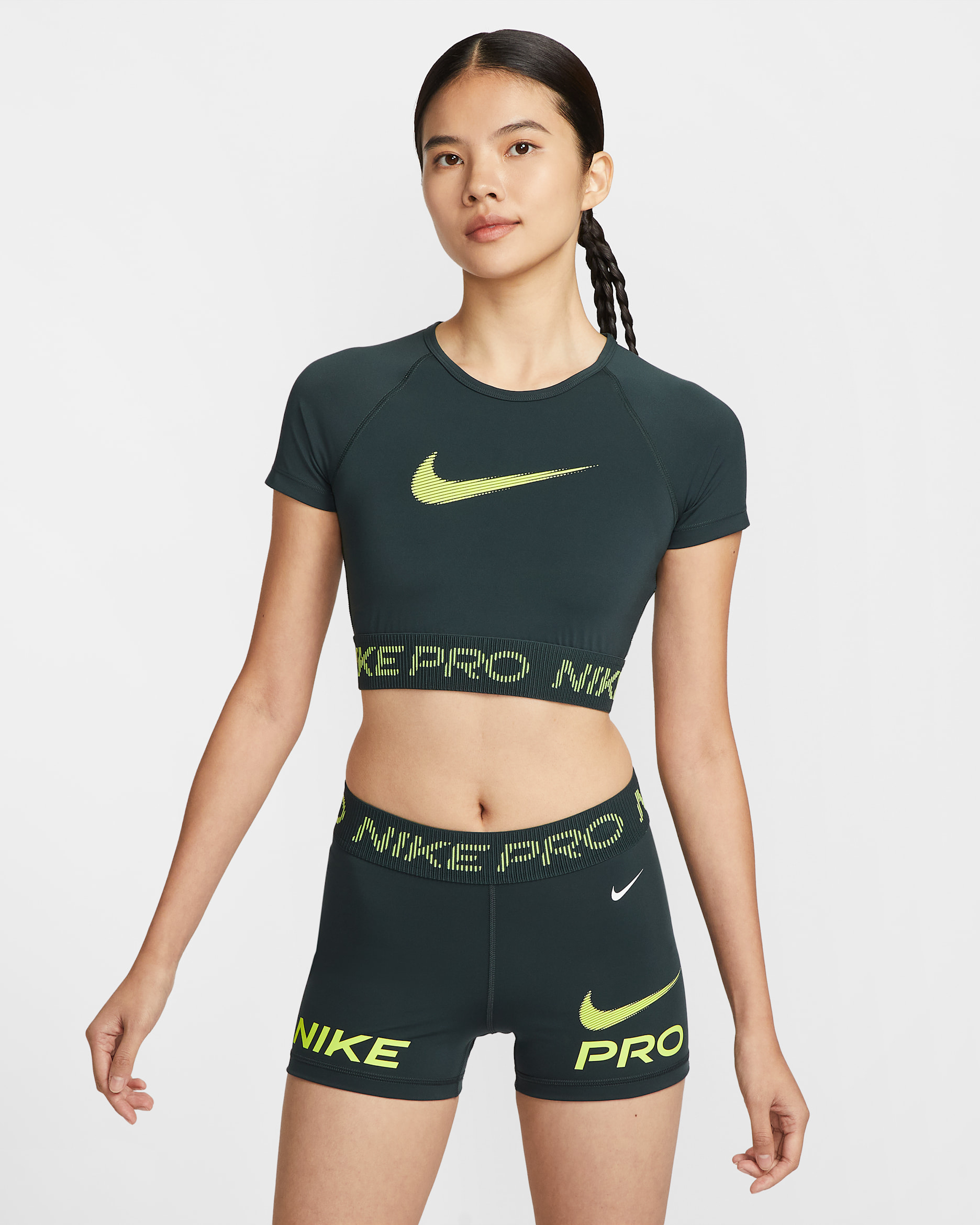 Nike Pro Women's Dri-FIT Short-Sleeve Cropped Graphic Top - Seaweed/Light Lemon Twist/White