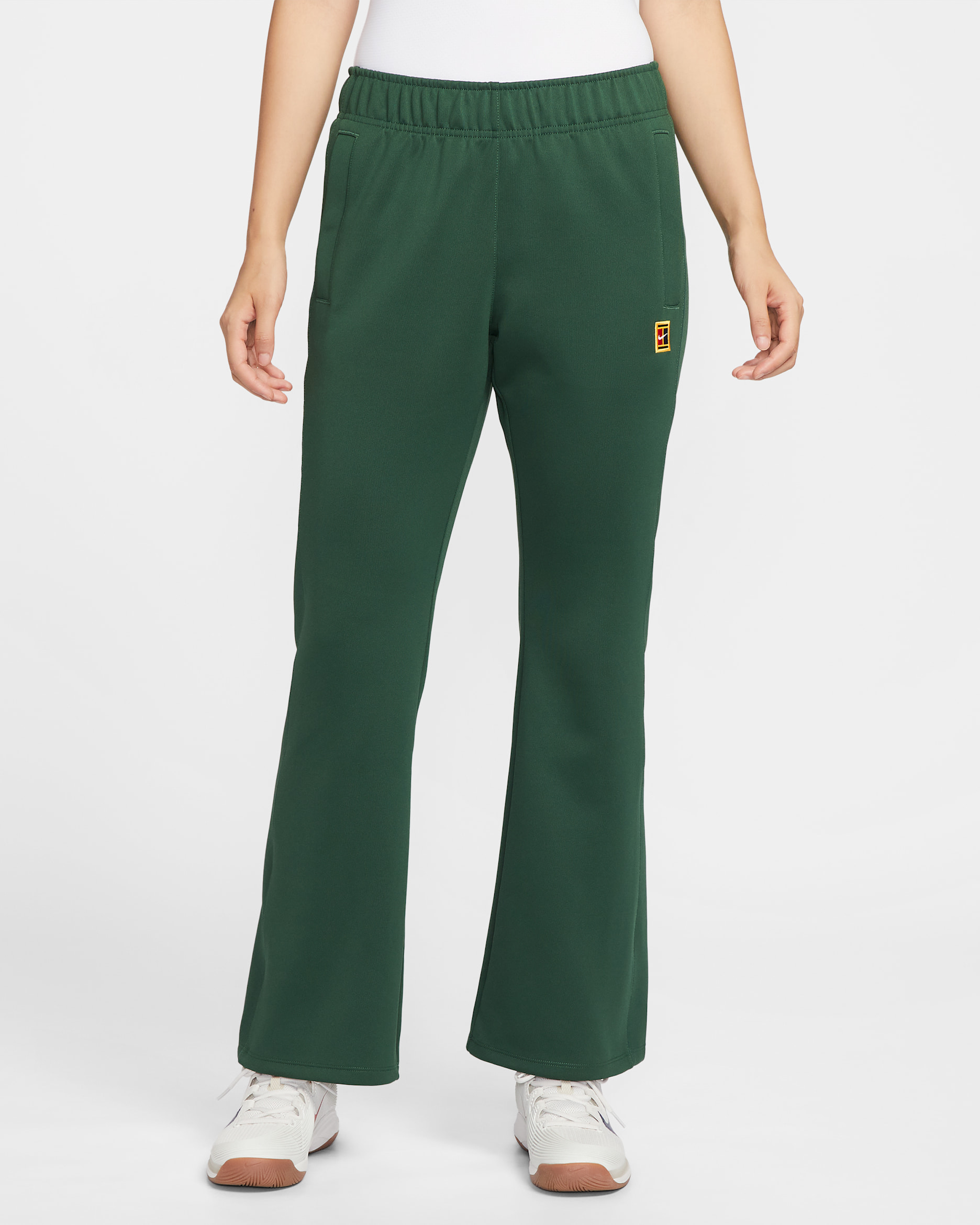 나이키코트 헤리티지 윈드러너 여성 미드라이즈 테니스 팬츠 - 퍼