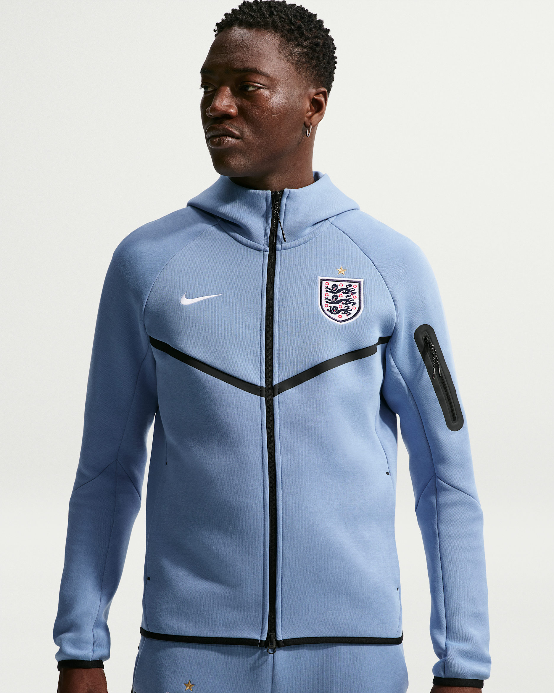 England Tech Fleece Windrunner Nike Football-hættetrøje med lynlås til mænd - Work Blue/hvid