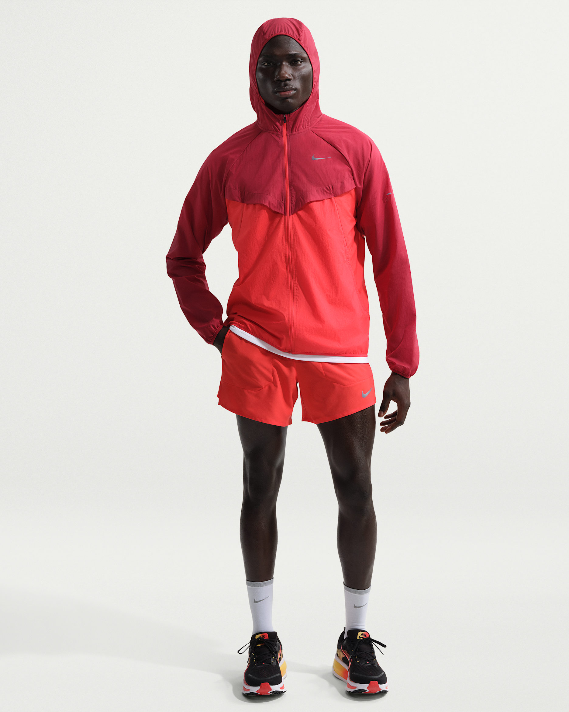 Calções de running forrados com slips de 13 cm Dri-FIT Nike Stride para homem - Carmesim claro