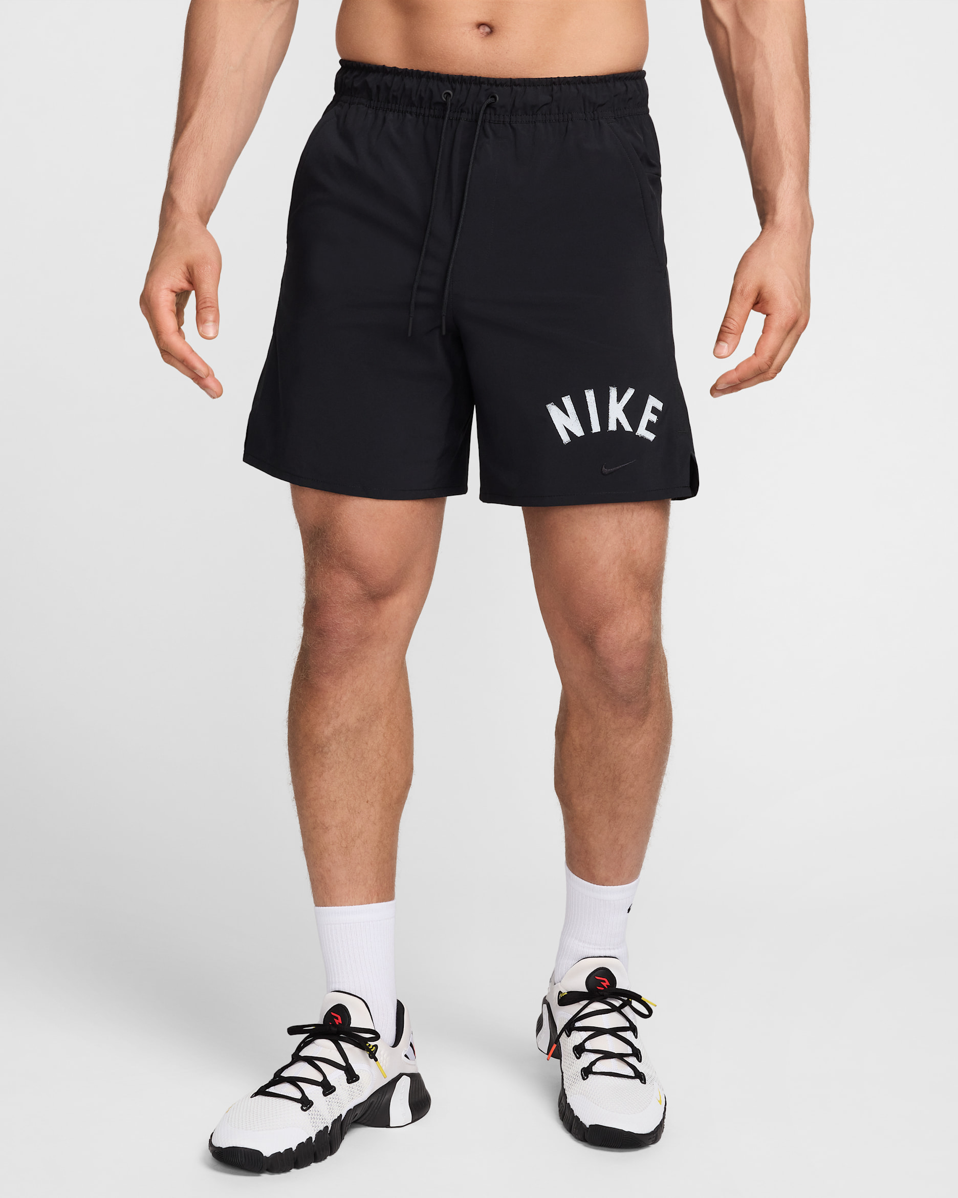 Shorts versátiles Dri-FIT de 18 cm sin forro para hombre Nike Unlimited Swoosh - Negro/Blanco