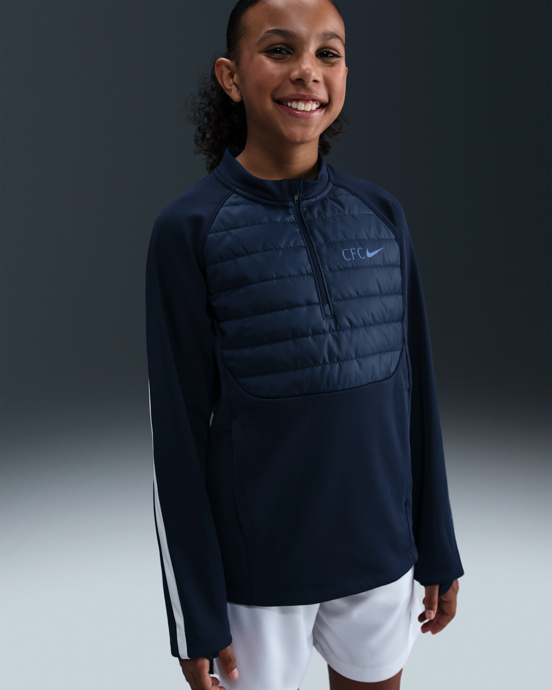 Chelsea F.C. Academy Winter Warrior Older Kids' Nike Therma-FIT Football Drill Top - Obsidian/Phantom/Rush Blue