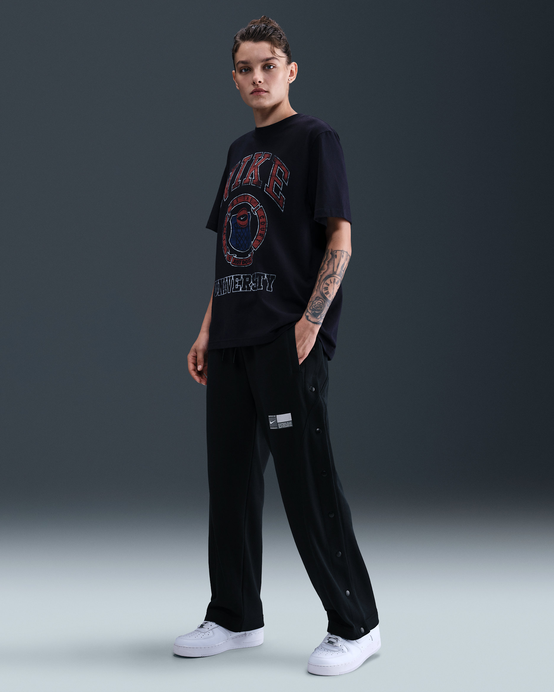 Nike Pantalón de básquetbol de apertura lateral de tejido Fleece - Mujer - Negro