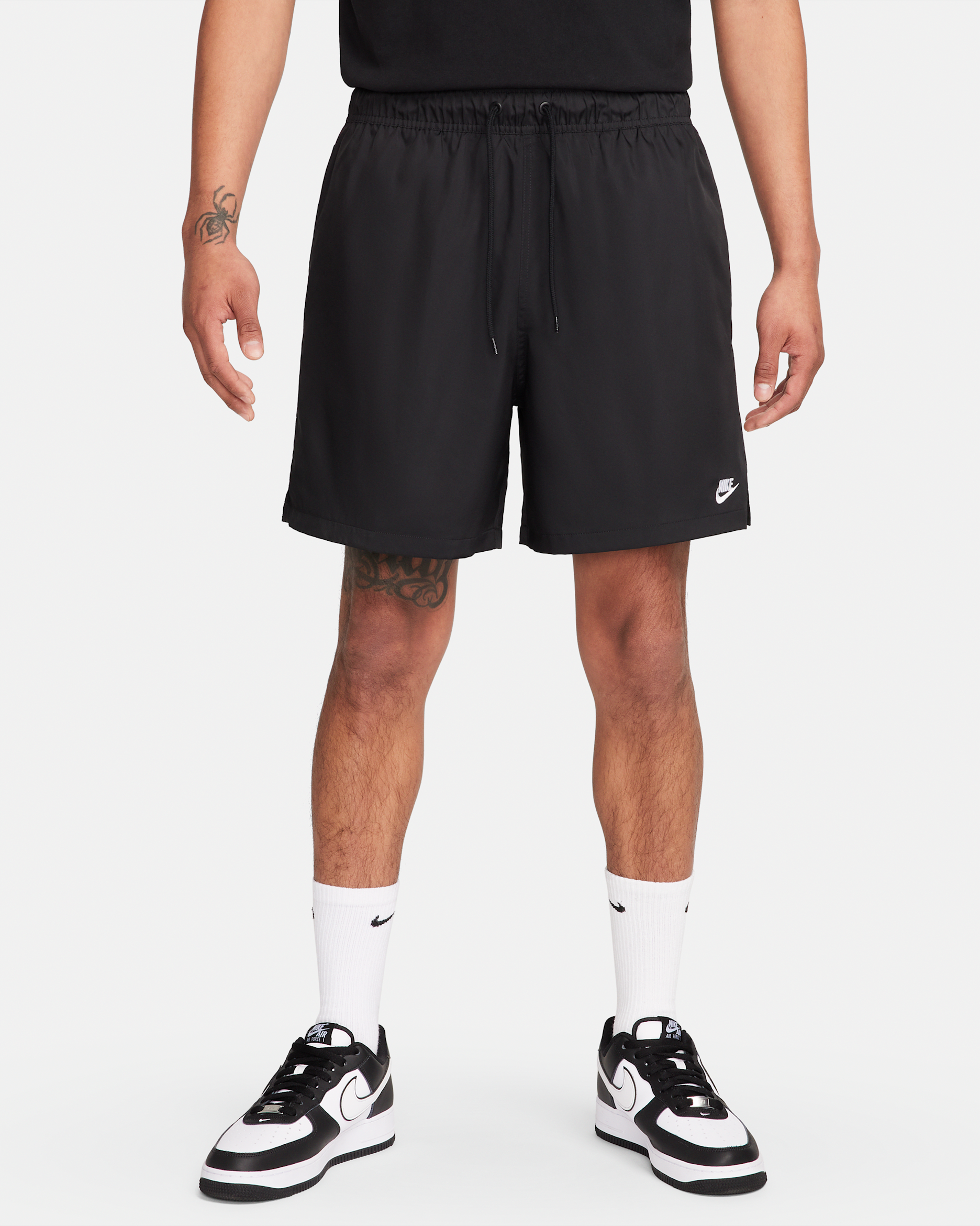 Shorts Flow in tessuto Nike Club – Uomo - Nero/Bianco