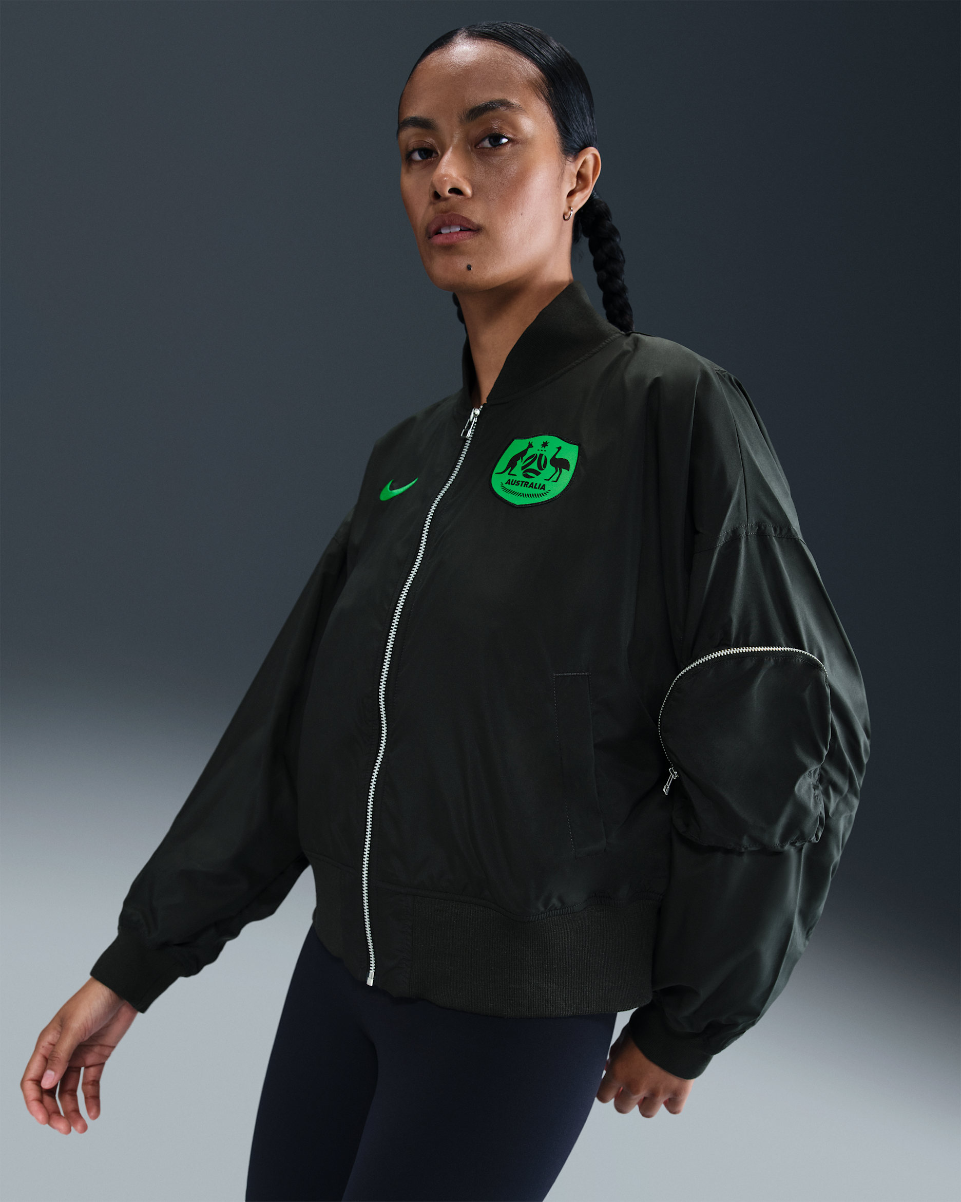 Australia Essential Women's Nike Football Oversized Bomber - Night Forest/Hyper Pink/Poison Green