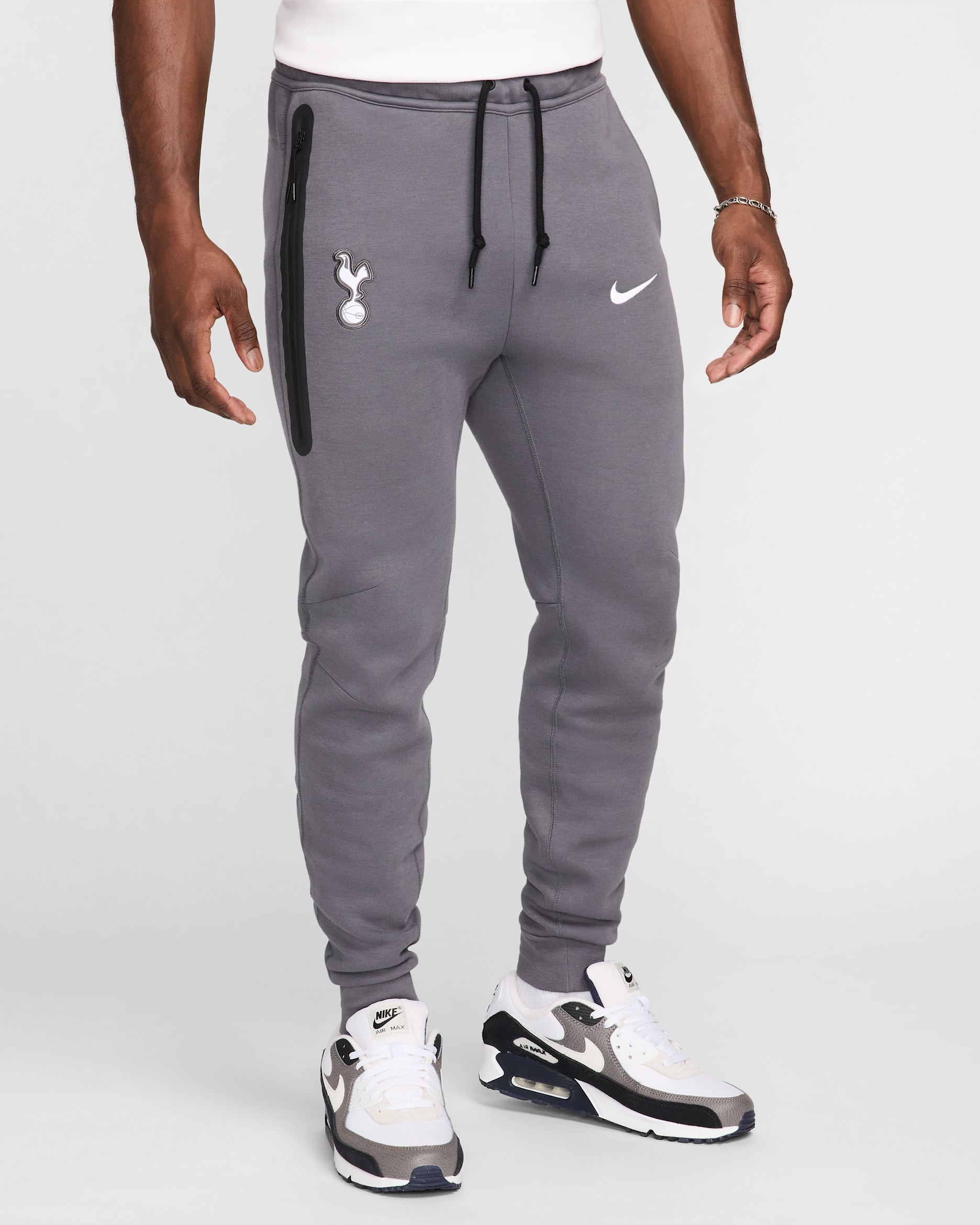 Tottenham Hotspur Tech Fleece Nike voetbalbroek voor heren - Dark Grey/Wit