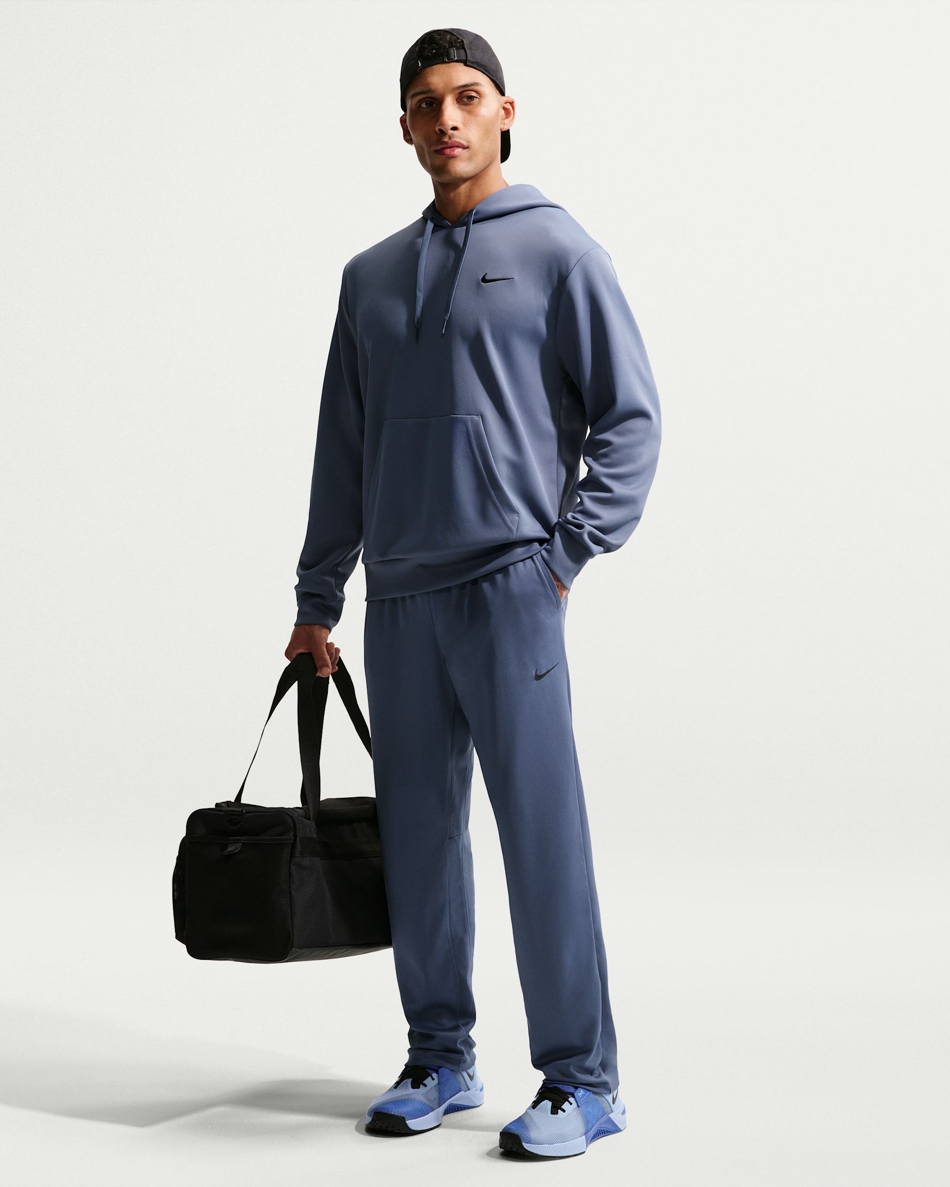 Pants Dri-FIT versátiles con dobladillo abierto para hombre Nike Totality - Azul difuso/Negro