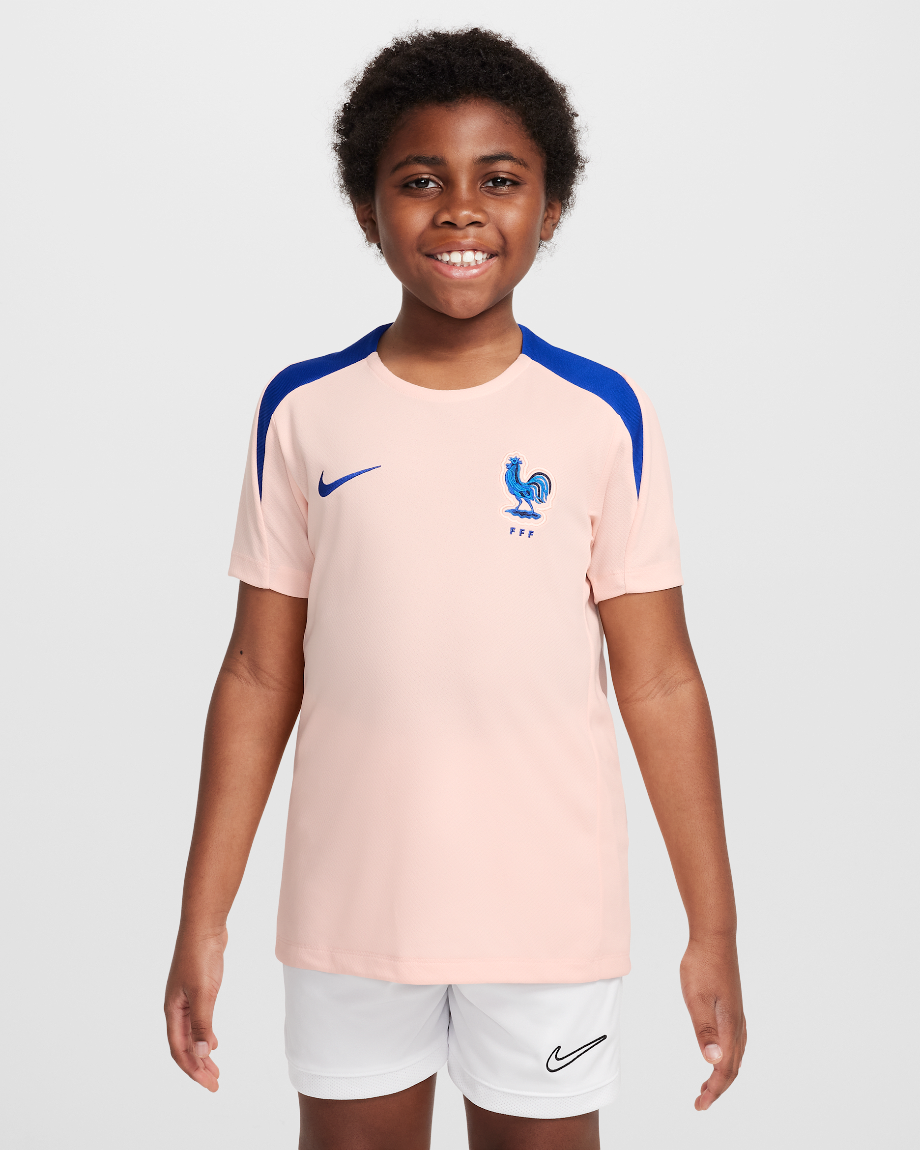 FFF Strike Older Kids' Nike Dri-FIT Football Short-Sleeve Top - Washed Coral/Bright Blue/Bright Blue