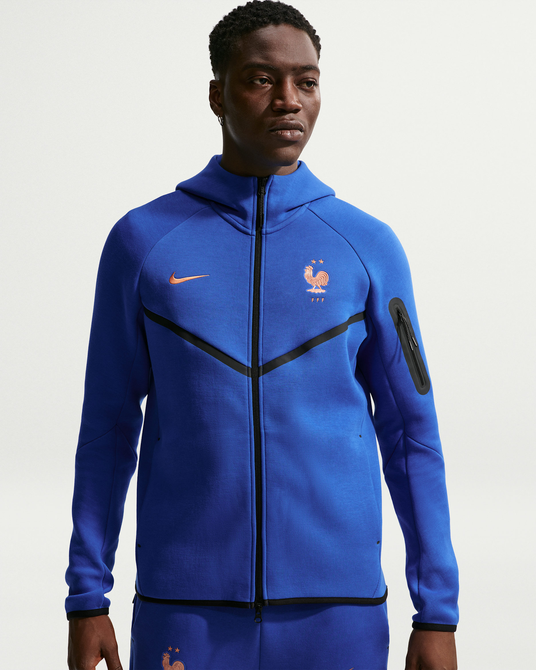 FFF Tech Fleece Windrunner Nike Football-hættetrøje med lynlås til mænd - Game Royal/Metallic Copper