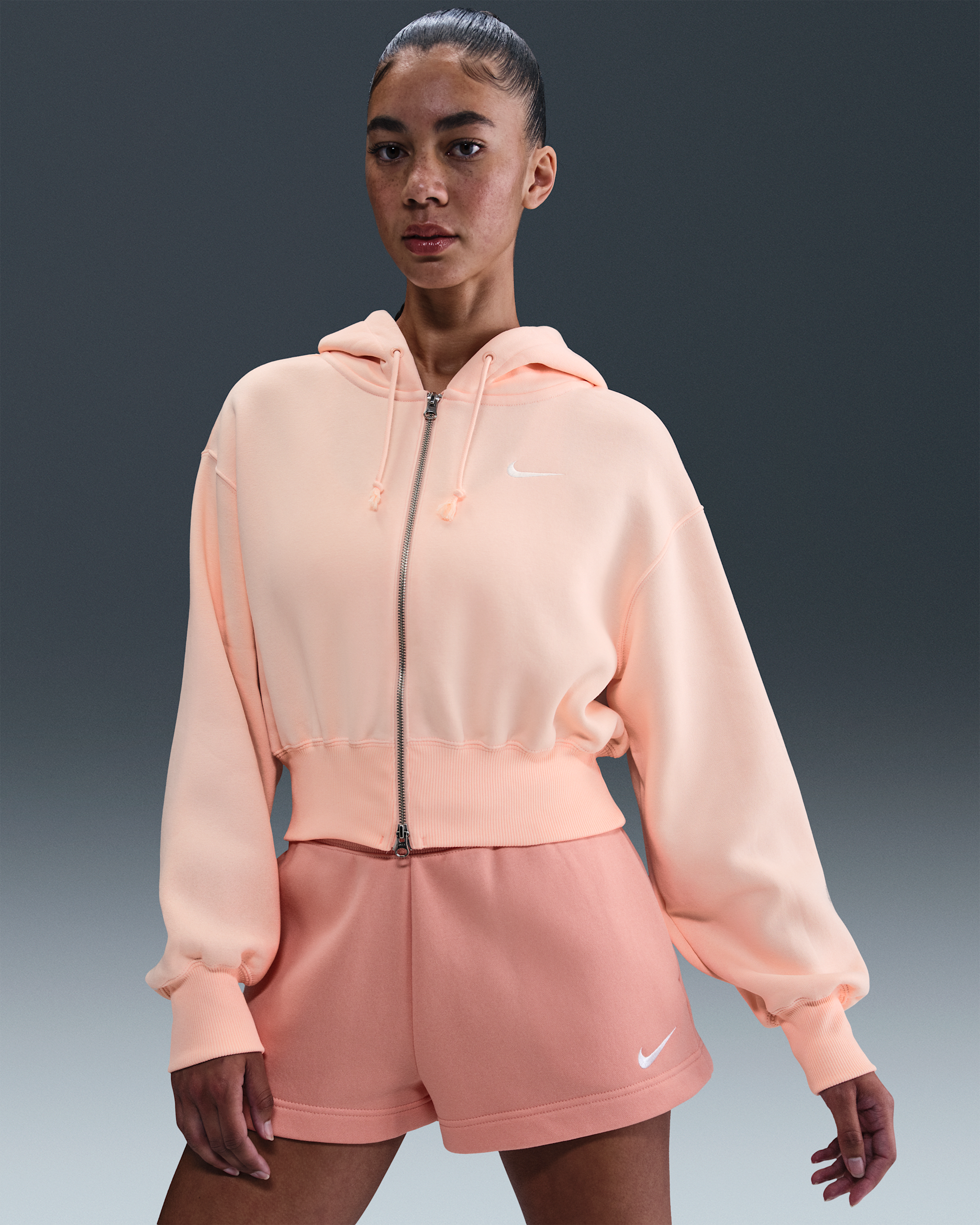 Sudadera con gorro holgada cropped de cierre completo para mujer Nike Sportswear Phoenix Fleece - Coral lavado/Vela