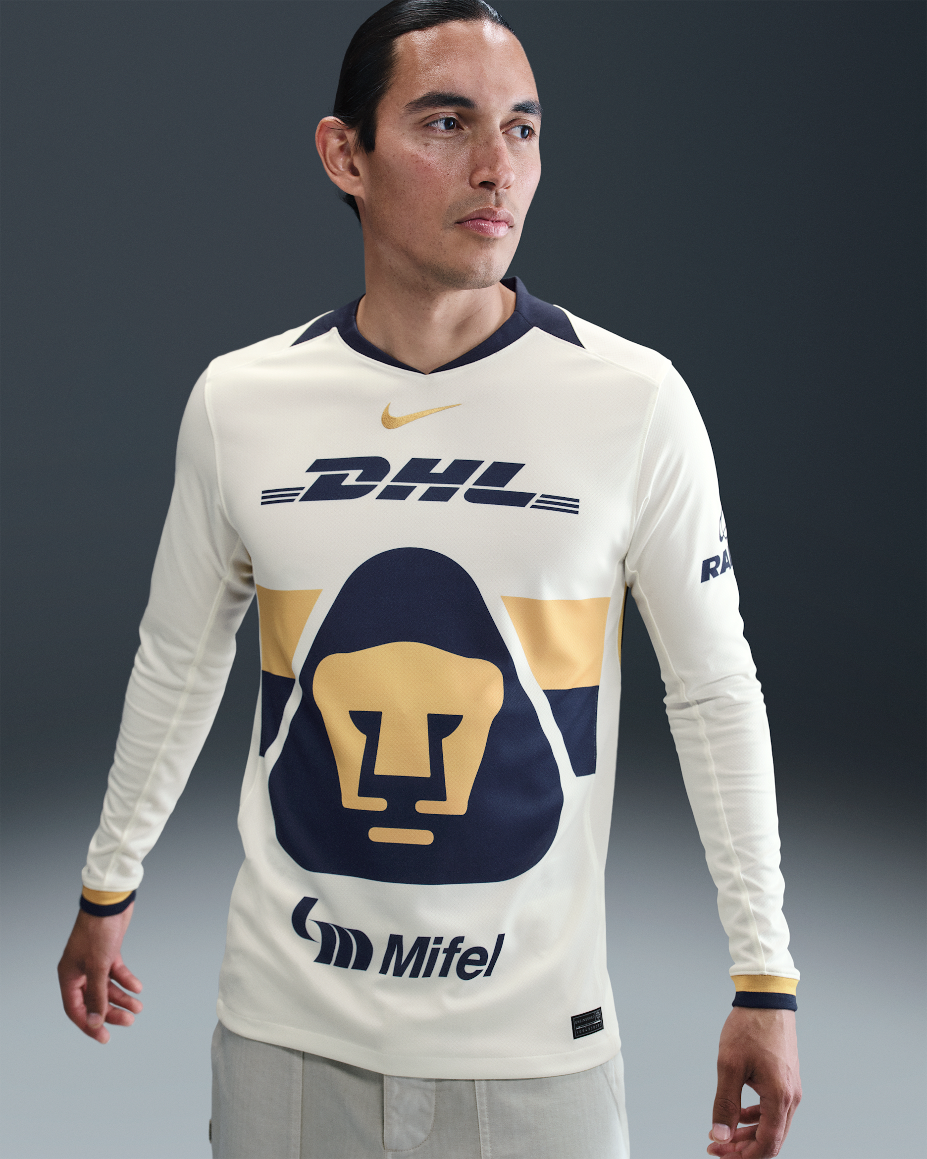 Jersey de fútbol de manga larga Nike Dri-FIT Replica de los Pumas UNAM local 2025/26 Stadium para hombre - Vela/Oro club