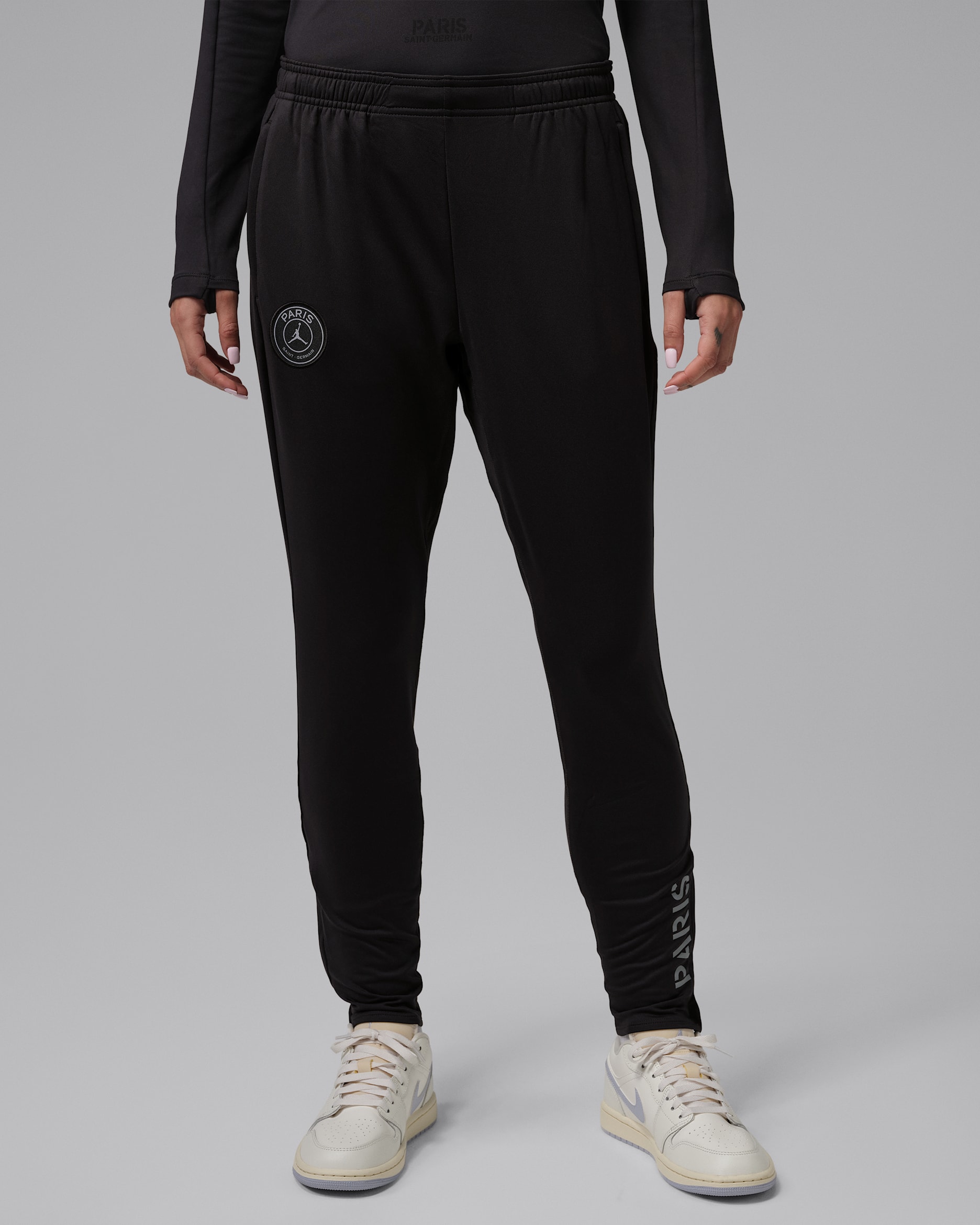 4e pantalon de foot en maille Jordan Dri-FIT Paris Saint-Germain Strike pour femme - Off Noir/Particle Grey