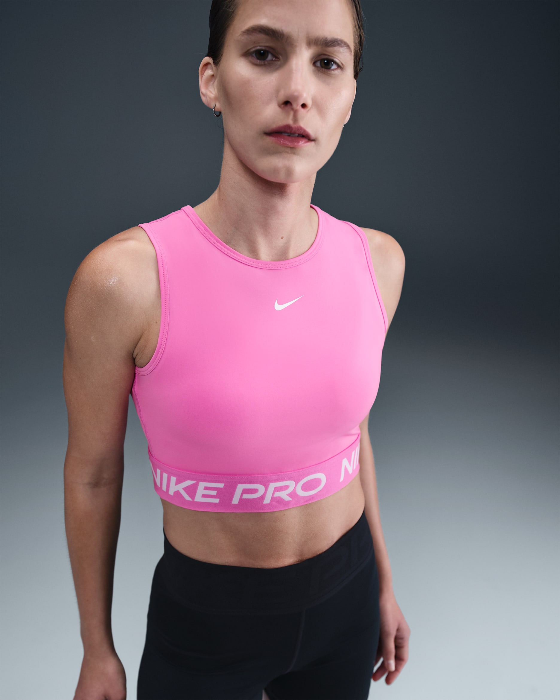 Camiseta de tirantes Dri-FIT cropped para mujer Nike Pro - Rosa alegre/Blanco