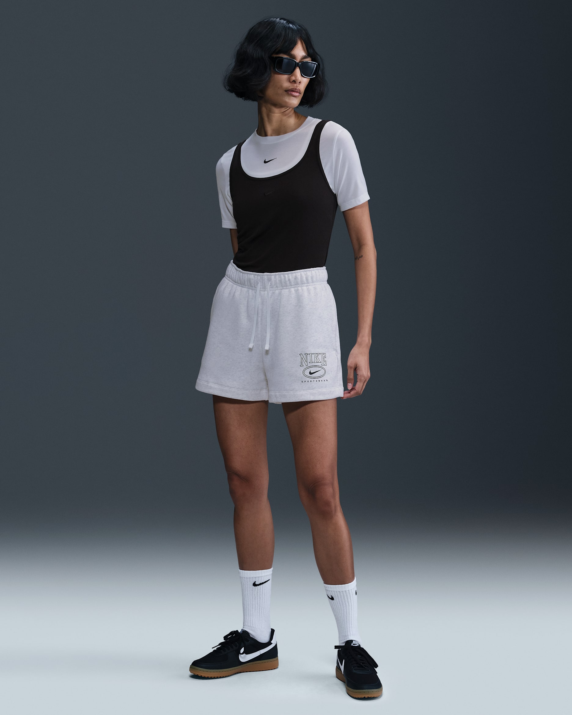 Shorts con gráfico de tiro medio de 10 cm para mujer Nike Sportswear Club Fleece - Abedul jaspeado