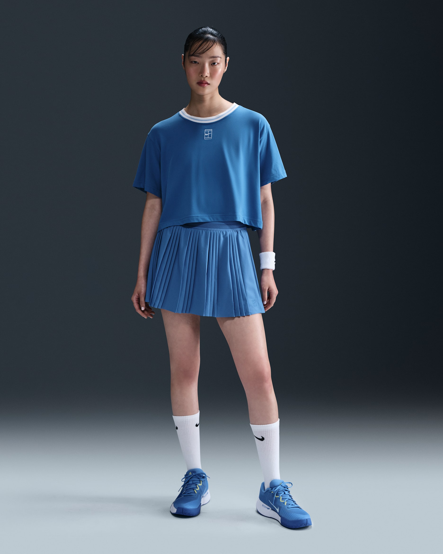 Falda de tenis Dri-FIT plisada para mujer NikeCourt Advantage - Estrella azul/Estrella azul