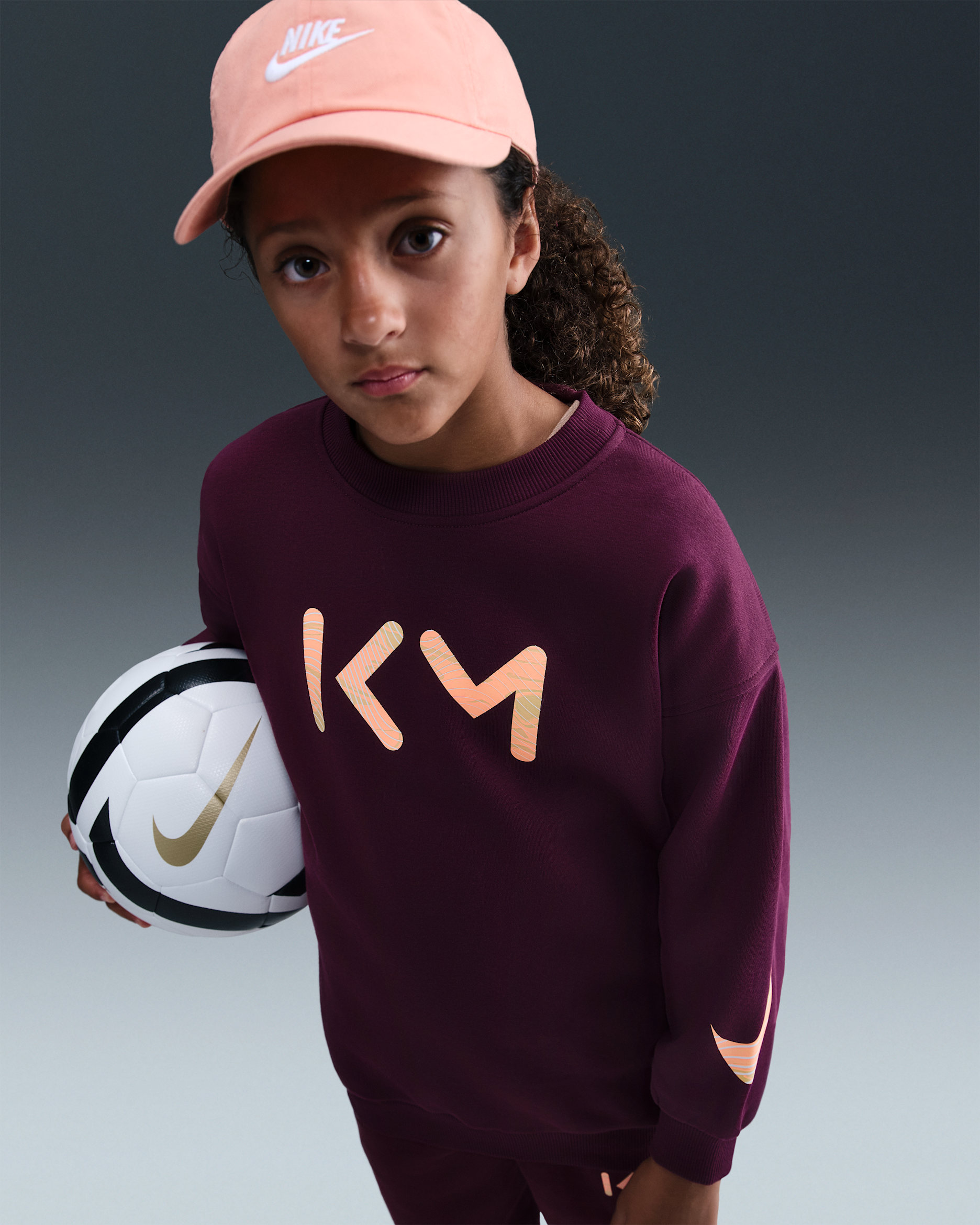Kylian Mbappé Club Fleece Nike Genç Çocuk (Kız) Bol Kesimli Crew Yakalı Futbol Üstü - Bordeaux/Orange Pulse