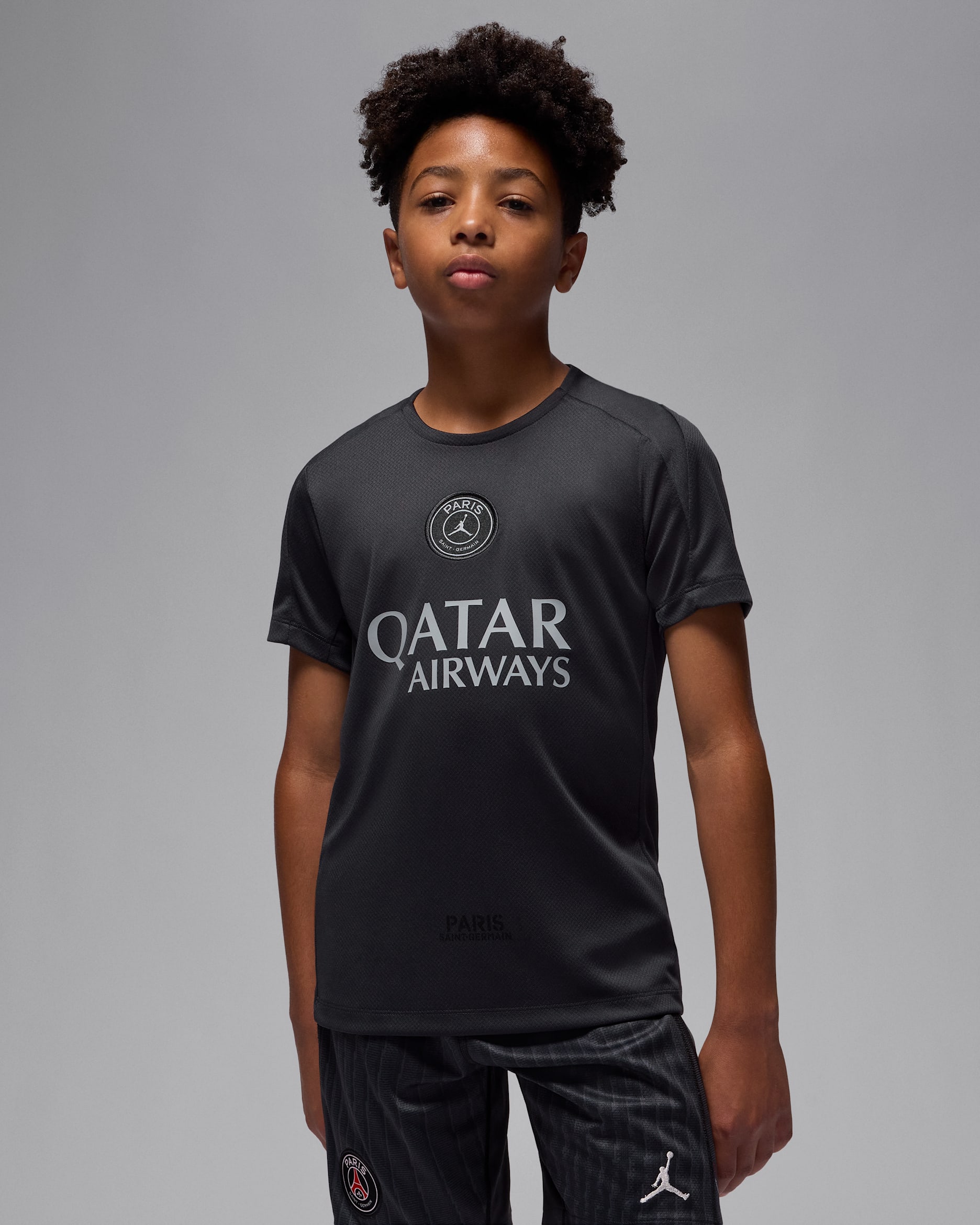 Paris Saint-Germain Strike Fourth Older Kids' Jordan Dri-FIT Football Short-Sleeve Top - Off-Noir/Off-Noir/Off-Noir/Particle Grey
